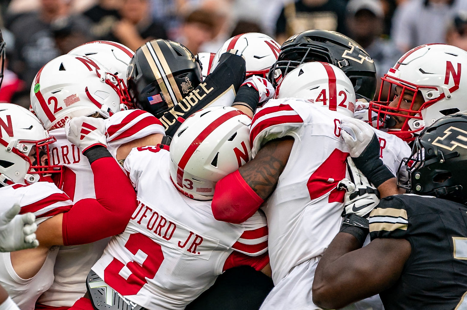 WEST LAFAYETTE, IN - SEPTEMBER 28, 2024: Purdue University Junior Running Back Devin Mockobee (45), Nebraska University Junior Defensive Back Marques Buford Jr. (3). Nebraska University Senior Defensive Back Isaac Gifford (2), Nebraska University Junior Linebacker Mikai Gbayor (42) during the Purdue University Boilermakers vs Nebraska University Cornhuskers Football game at Ross-Ade Stadium(Photo by Steve Bowen / Bowen Arrow Photography / Northern Indiana Sports Report)