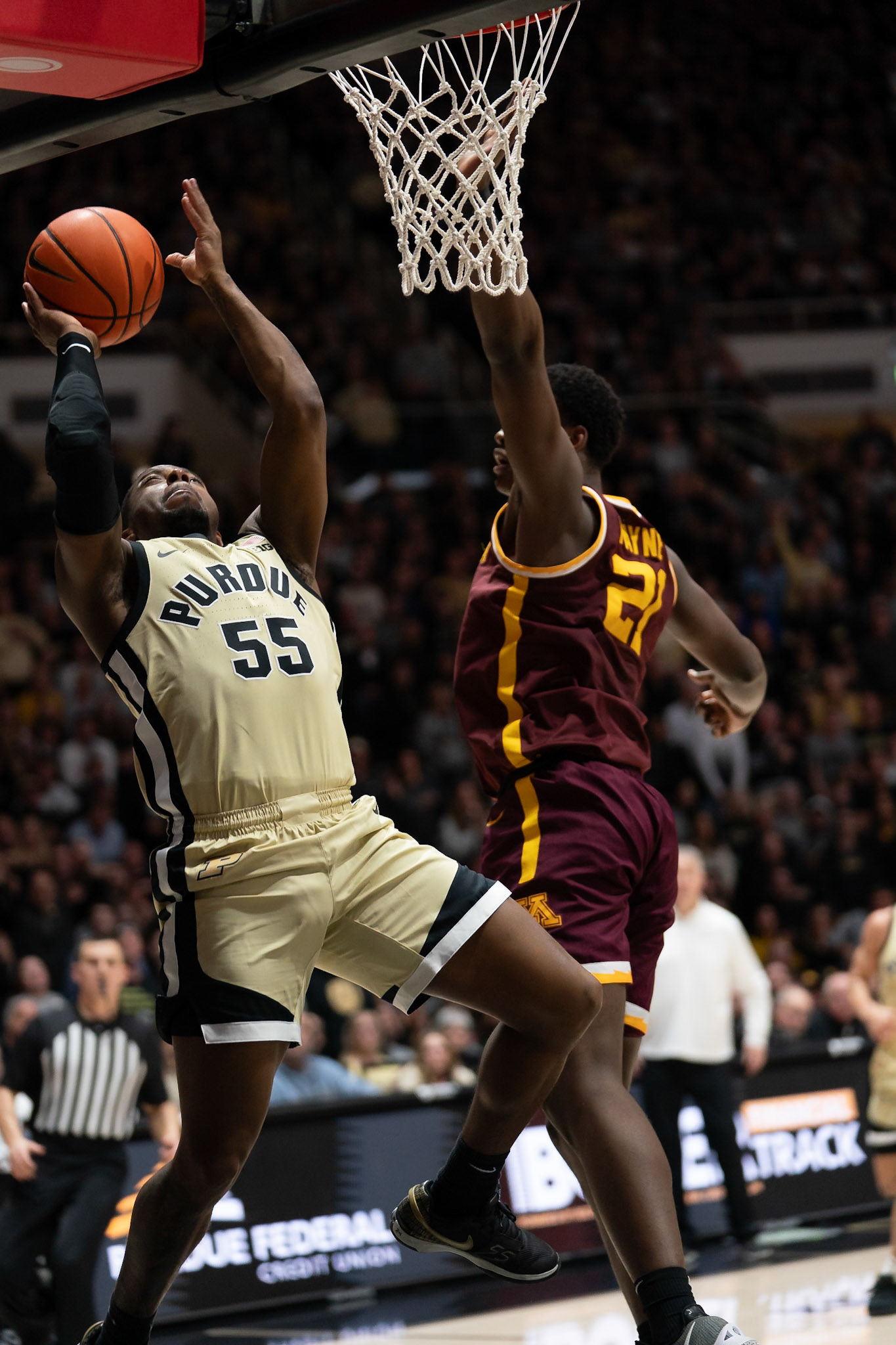 WEST LAFAYETTE, IN - FEBRUARY 15, 2024: Purdue 5th year Guard Lance Jones (55), Minnesota Sophomore Forward Pharrel Payne (21) in Purdue Boilermakers Men's Basketball vs the Minnesota Golden Gophers at Mackey Arena(Photo by Steve Bowen / Bowen Arrow Photography / Northern Indiana Sports Report)