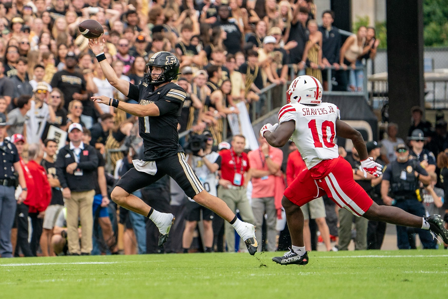 WEST LAFAYETTE, IN - SEPTEMBER 28, 2024: Purdue University Senior Quaterback Hudson Card (1), Nebraska University Freshman Linebacker Vincent Shavers Jr. (10) during the Purdue University Boilermakers vs Nebraska University Cornhuskers Football game at Ross-Ade Stadium(Photo by Steve Bowen / Bowen Arrow Photography / Northern Indiana Sports Report)