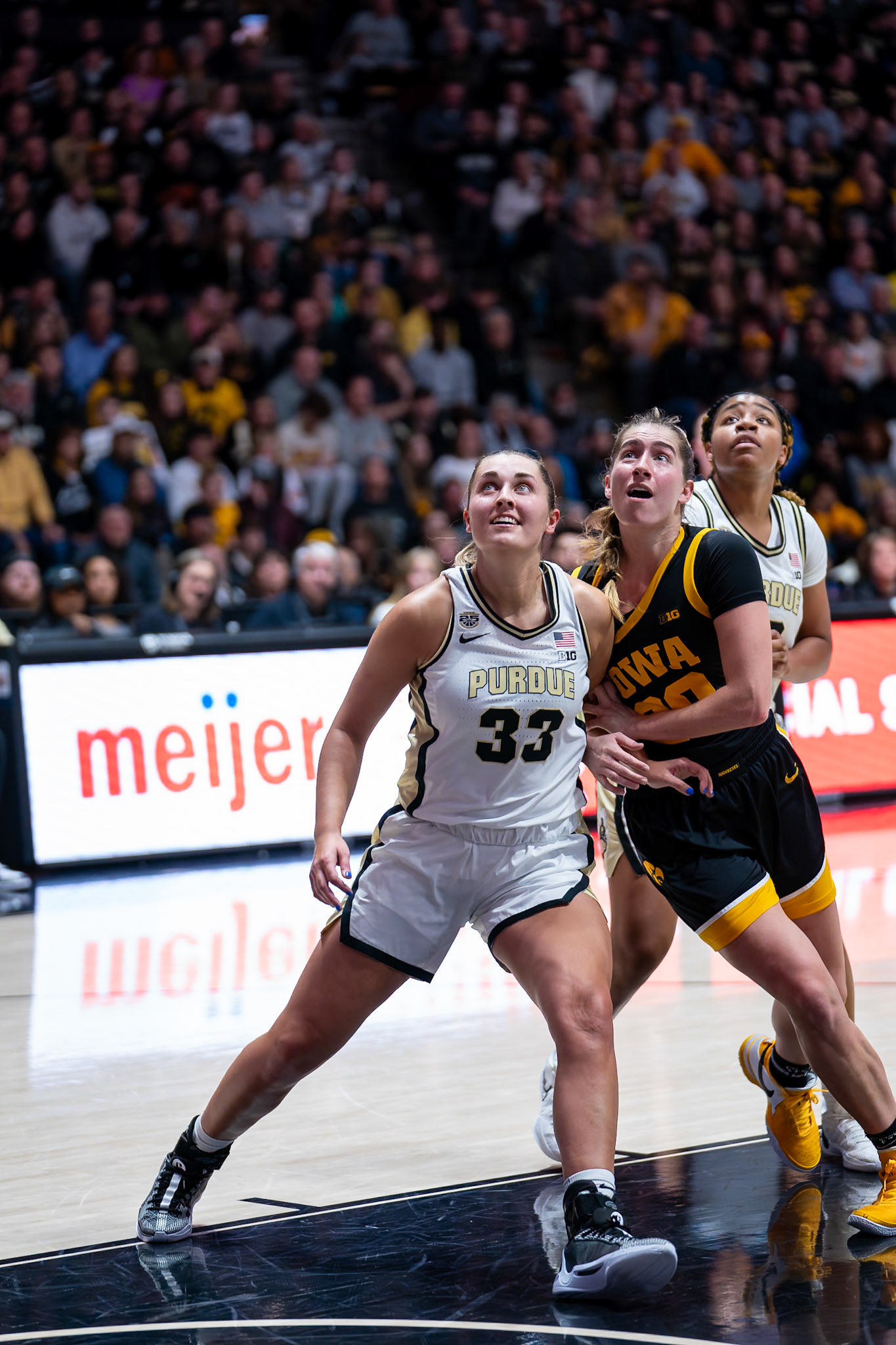 WEST LAFAYETTE, IN - JANUARY 10, 2024: Purdue Senior Guard Madison Layden (33), Iowa Guard Graduate Kate Martin (20) competing in Purdue Boilermaker Women's Basketball vs the Iowa Hawkeyes at Mackey Arena(Photo by Steve Bowen / Bowen Arrow Photography / Northern Indiana Sports Report)