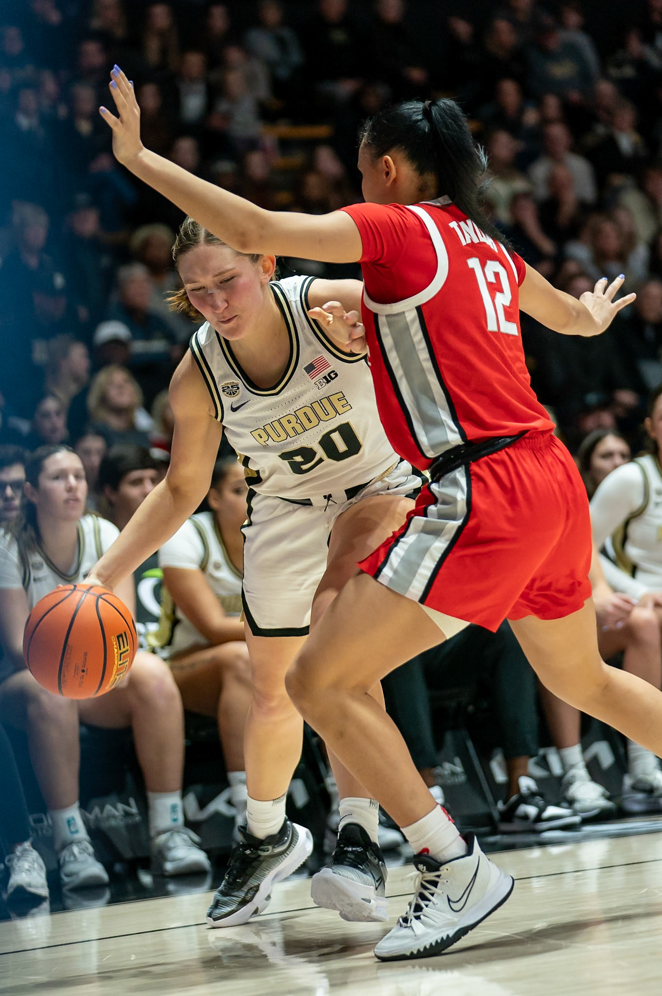 WEST LAFAYETTE, IN - JANUARY 28, 2024: Purdue Freshman Forward Mary Ashley Stevenson (20), Ohio State Guard Graduate Celeste Taylor (12) competing in Purdue Boilermaker Women's Basketball versus the Ohio State Buckeyes at Mackey Arena(Photo by Steve Bowen / Bowen Arrow Photography / Northern Indiana Sports Report)
