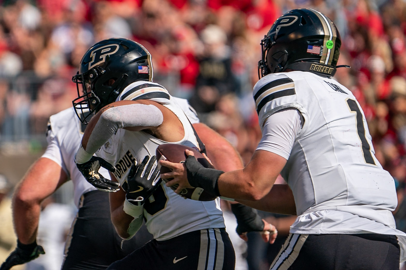 MADISON, WI - OCTOBER 5, 2024: Purdue University Senior Quaterback Hudson Card (1) pulls the handoff back from Purdue University Junior Running Back Devin Mockobee (45) during the Purdue University Boilermakers at University of Wisconsin Badger Football game at Camp Randall Stadium(Photo by Steve Bowen / NISports Report)(Photo by Steve Bowen / NISports Report)