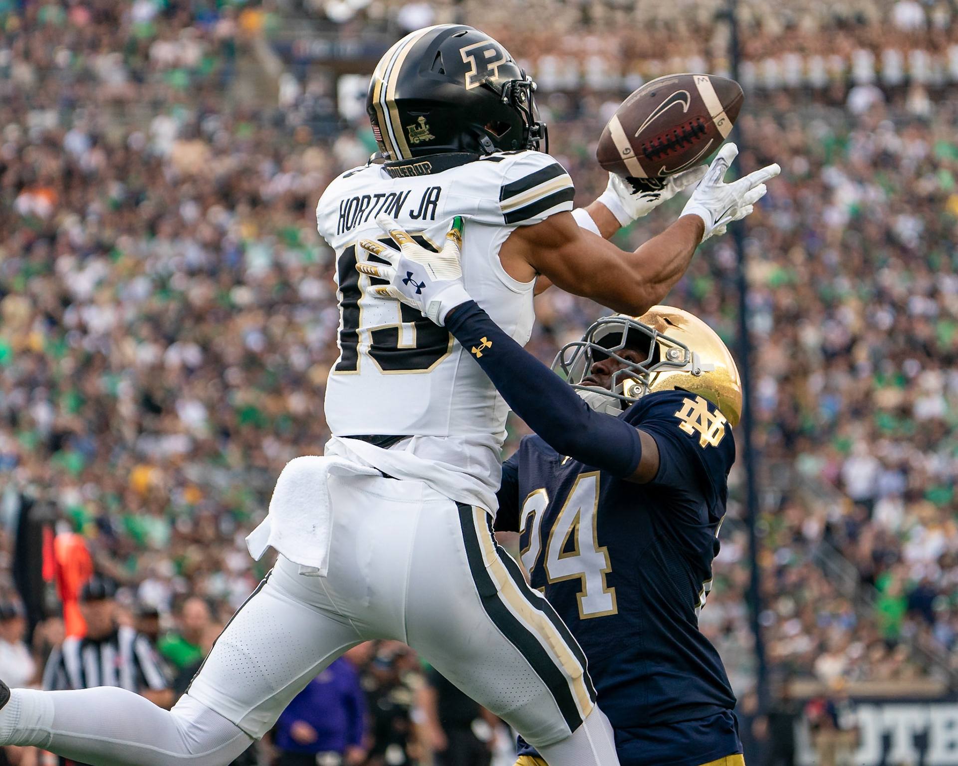 SOUTH BEND, IN - SEPTEMBER 20, 2025: Purdue University Senior Wide Receiver EJ Horton Jr. (13) tries to haul in a pass in the endone while being defended by Notre Dame University's Freshman CB Mark Zackery IV (24) during the Purdue Boilermakers at Notre Dame Fighting Irish Football at Notre Dame Stadium(Photo by Steve Bowen / Northern Indiana Sports Report)