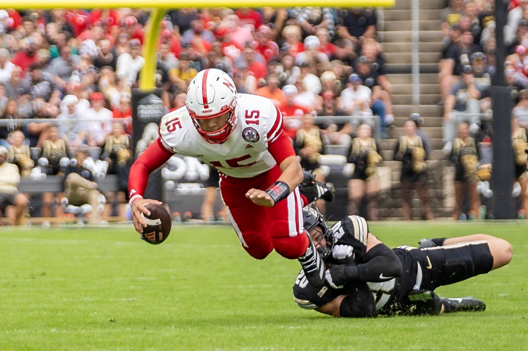 WEST LAFAYETTE, IN - SEPTEMBER 28, 2024: Nebraska University Freshman Quarterback Dylan Raiola (15), Purdue University Redshirt Freshman Linebacker Winston Berglund (20) during the Purdue University Boilermakers vs Nebraska University Cornhuskers Football game at Ross-Ade Stadium(Photo by Steve Bowen / Bowen Arrow Photography / Northern Indiana Sports Report)