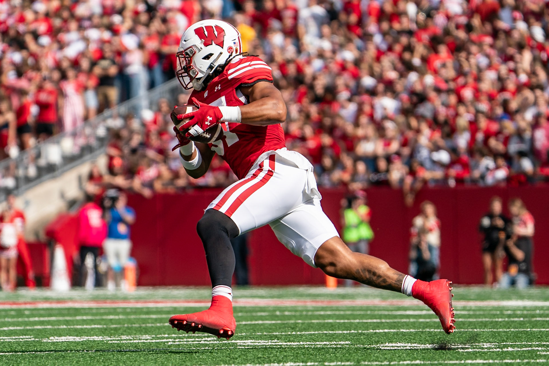 MADISON, WI - OCTOBER 5, 2024: University of Wisconsin Redshirt Senior TE Riley Nowakowski (37) catching a pass and turning up field during the Purdue University Boilermakers at University of Wisconsin Badger Football game at Camp Randall Stadium(Photo by Steve Bowen / NISports Report)