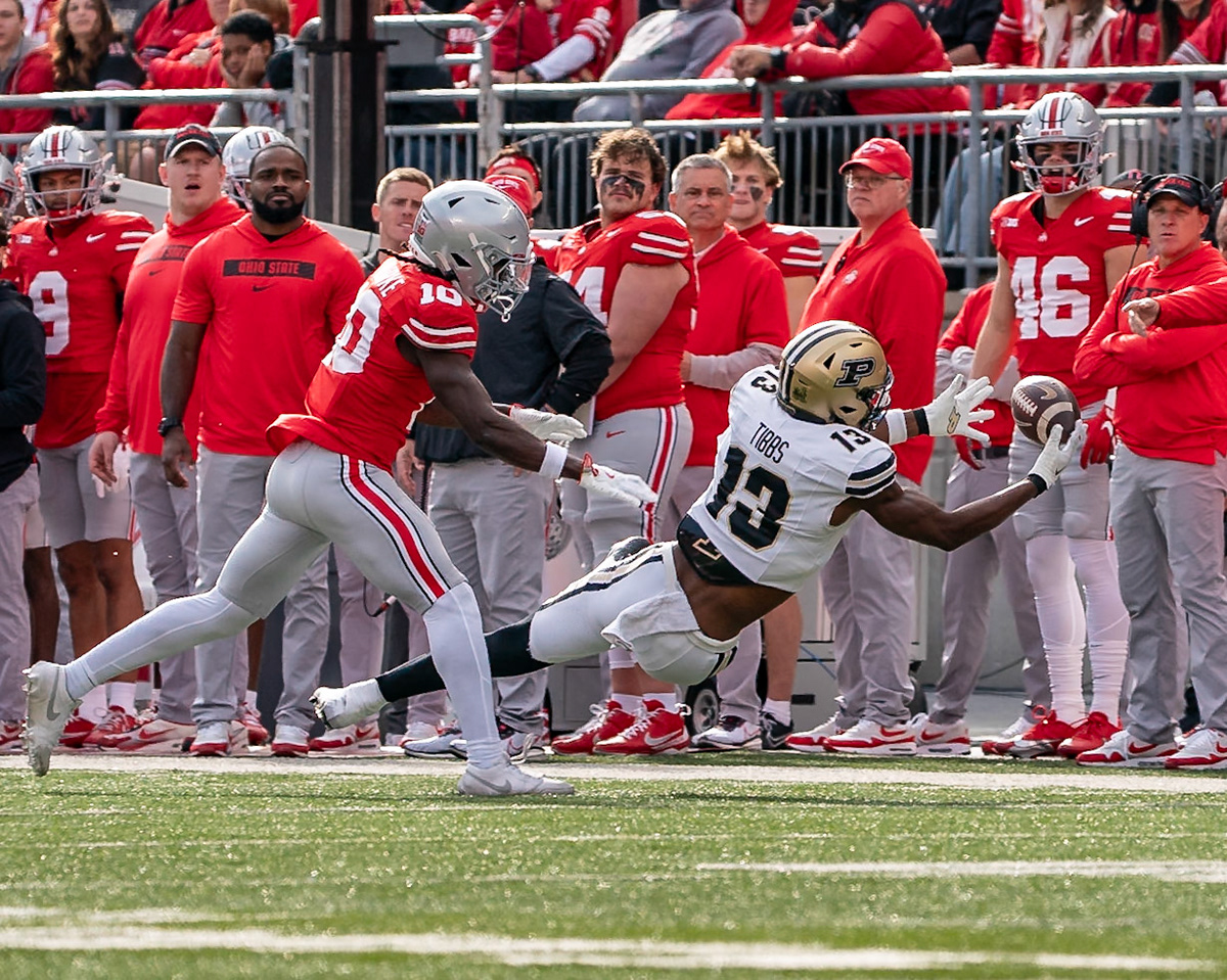 COLUMBUS UNIVERSITY, OH - NOVEMBER 9, 2024: Purdue University Sophomore Wide Receiver Jaron Tibbs (13), Ohio State University Senior Cornerback Denzel Burke (10) in Purdue University Boilermakers at University of Ohio Buckeyes Football game at Ohio Stadium(Photo by Steve Bowen / Bowen Arrow Photography / Northern Indiana Sports Report)