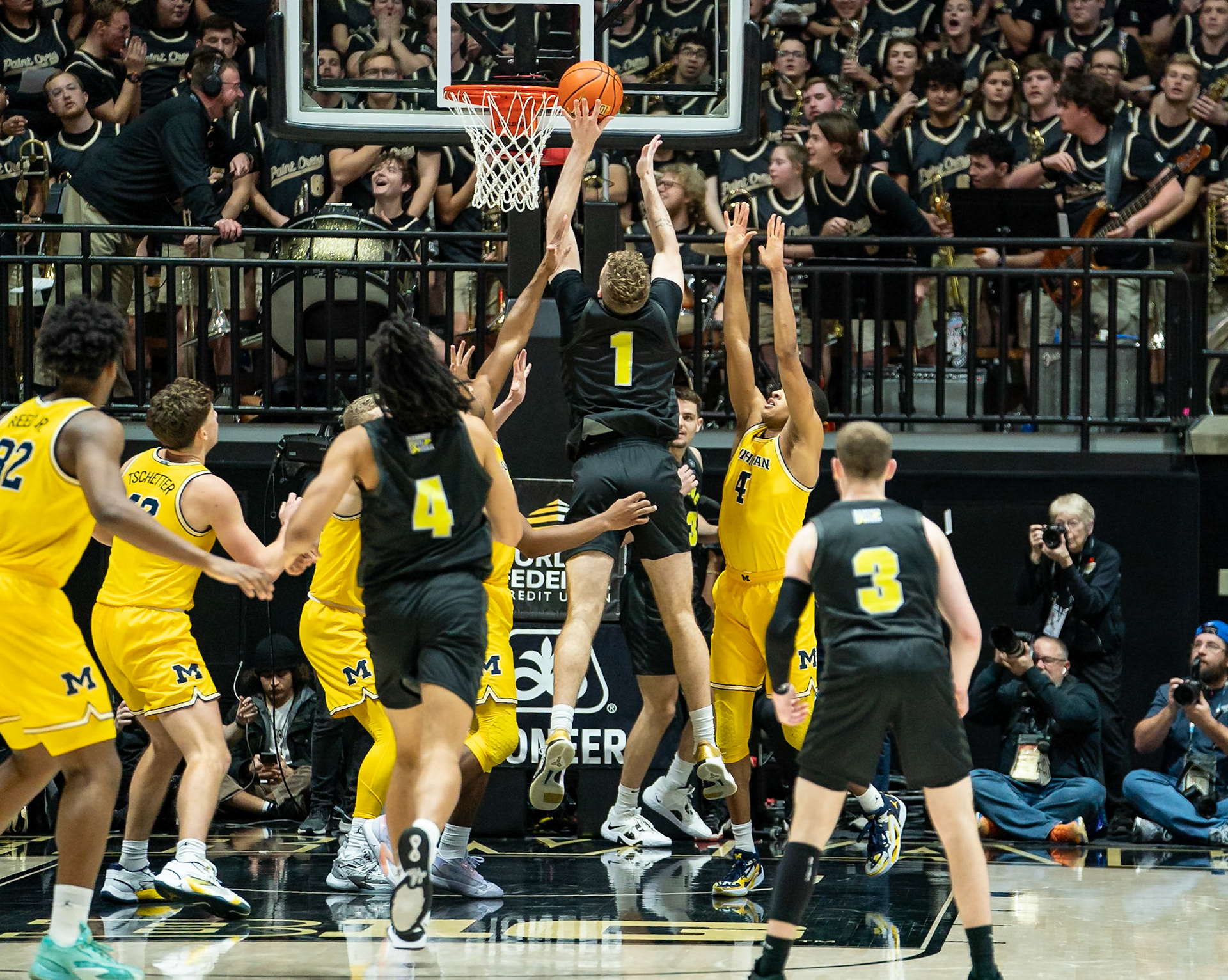 WEST LAFAYETTE, IN - JANUARY 23, 2024: Purdue Junior Forward Caleb Furst (1), Michigan Graduate Guard Nimari Burnett (4) competing in Purdue versus Michigan Mens Basketball at Mackey Arena(Photo by Steve Bowen / Bowen Arrow Photography / Northern Indiana Sports Report)