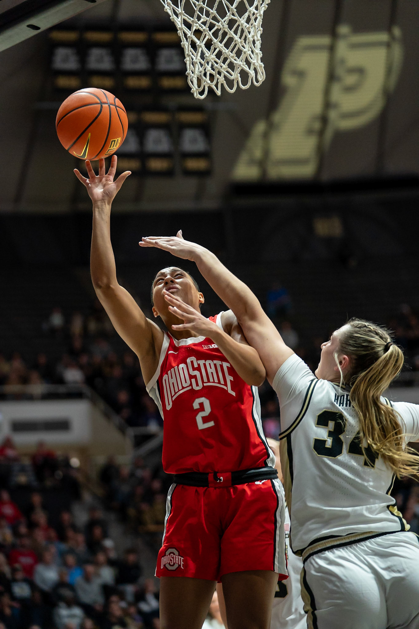 WEST LAFAYETTE, IN - JANUARY 28, 2024: Ohio State Guard/Forward Junior Taylor Thierry (2), Purdue 6th Year Forward Caitlyn Harper (34) competing in Purdue Boilermaker Women's Basketball versus the Ohio State Buckeyes at Mackey Arena(Photo by Steve Bowen / Bowen Arrow Photography / Northern Indiana Sports Report)