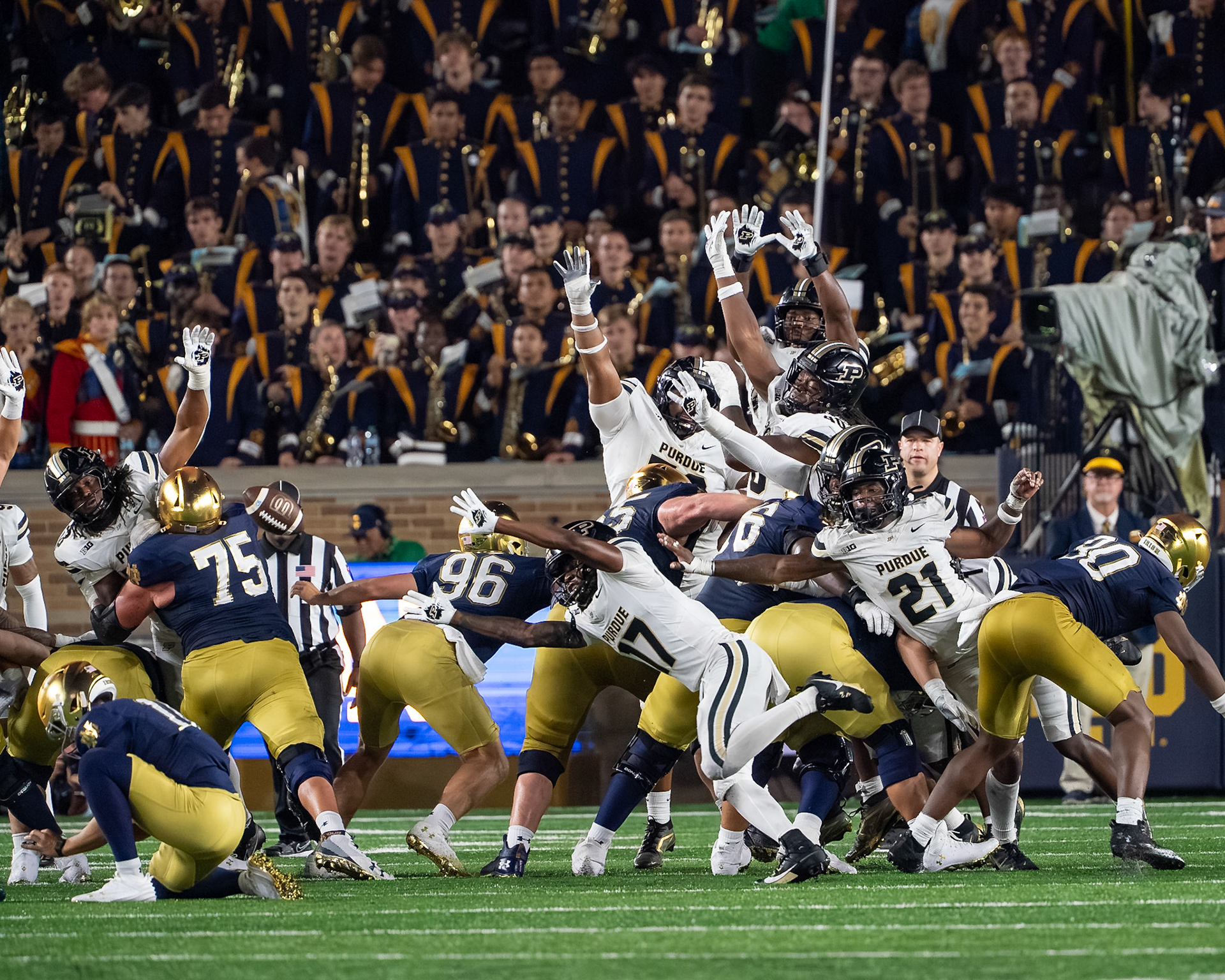 SOUTH BEND, IN - SEPTEMBER 20, 2025: Purdue University Sophomore Defensive Back Traveon Wright (17), Purdue University Senior Defensive Back Tahj Ra-El (21), Purdue University Senior Defensive Lineman Josh Burney (53), and Purdue University Sophomore Defensive Lineman Ian Jeffries (40) trying to get the field goal block during the Purdue Boilermakers at Notre Dame Fighting Irish Football at Notre Dame Stadium(Photo by Steve Bowen / Northern Indiana Sports Report)