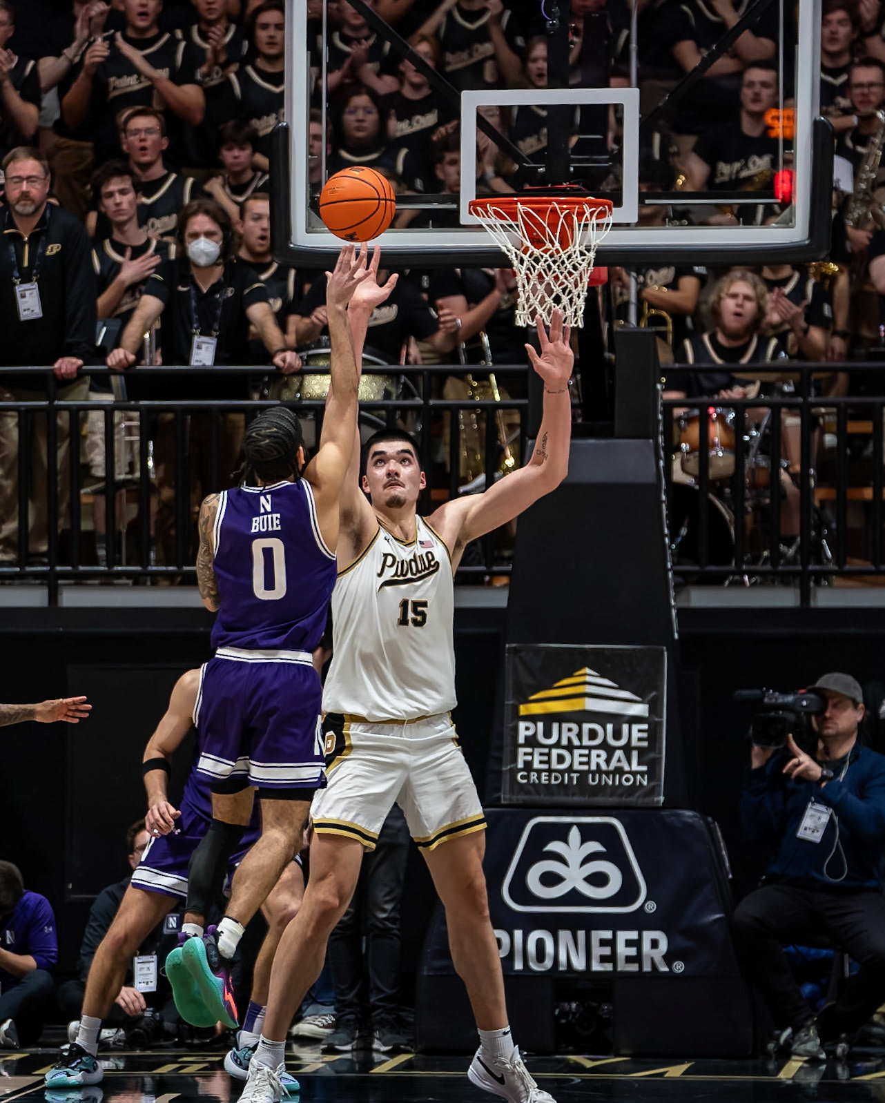 WEST LAFAYETTE, IN - JANUARY 31, 2024: Northwestern Graduate Guard Boo Buie (0), Purdue Senior Center Zach Edey (15) competing in Purdue Boilermakers Mens Basketball versus the Northwestern Wildcats at Mackey Arena(Photo by Steve Bowen / Bowen Arrow Photography / Northern Indiana Sports Report)
