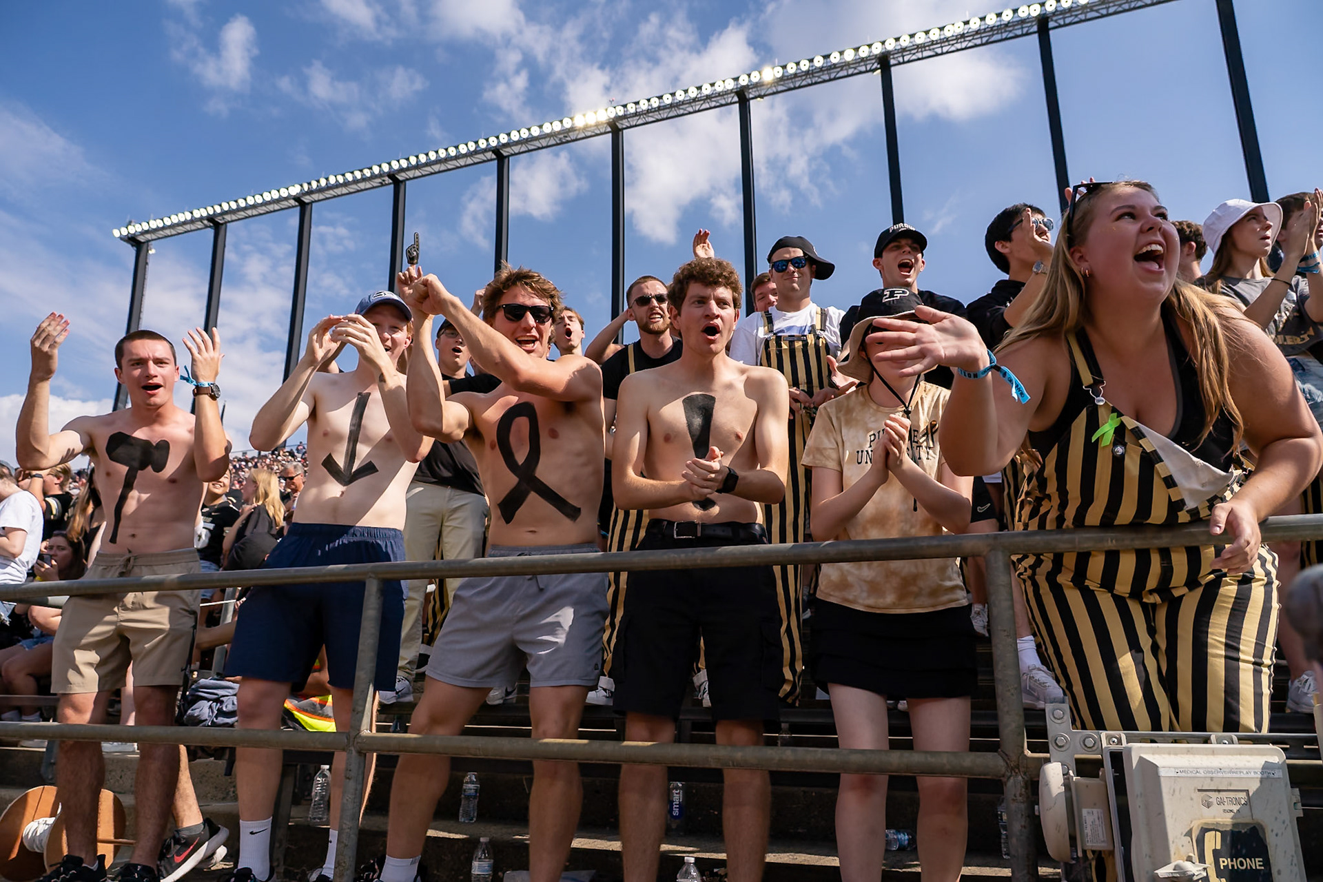 WEST LAFAYETTE, IN - OCTOBER 4, 2025: Purdue University Ross-Ade Brigade showing the Hammer Down Cancer body paint during the Purdue Boilermaker Football vs University of Illinois Fighting Illini at Ross-Ade Stadium(Photo by Steve Bowen / Northern Indiana Sports Report)