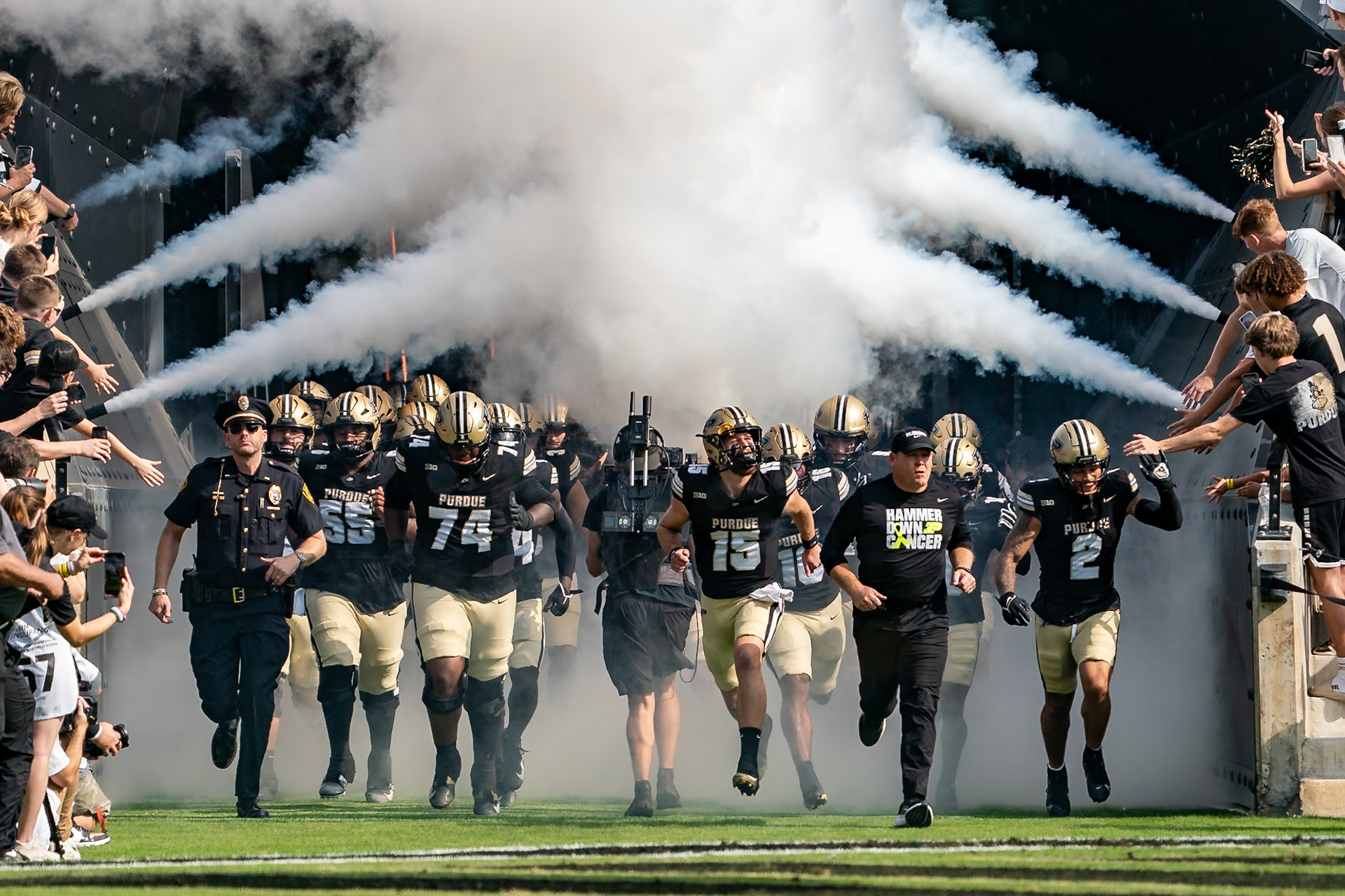 WEST LAFAYETTE, IN - OCTOBER 4, 2025: Purdue University Football Head Coach Barry Odom, Purdue University Sophomore Quarterback Ryan Browne (15), Purdue University Senior Offensive Lineman Jalen St. John (74), Purdue University Senior Wide Receiver Michael Jackson III (2), and Purdue University Sophomore Offensive Lineman Bradyn Joiner (55) run out of the tunnel just before the Purdue Boilermaker Football vs University of Illinois Fighting Illini at Ross-Ade Stadium(Photo by Steve Bowen / Northern Indiana Sports Report)