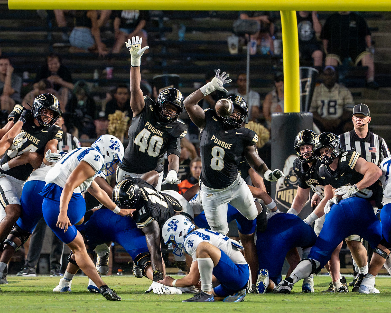 WEST LAFAYETTE, IN - SEPTEMBER 4, 2026: Purdue University Junior Defensive End C.J. Madden (8) leaps over the Indiana State line in an attempt to block an extra point during the Purdue Boilermaker Football game vs the Indiana State Sycamores at Ross-Ade Stadium(Photo by Steve Bowen / Northern Indiana Sports Report)