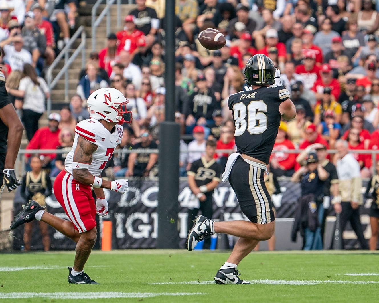 WEST LAFAYETTE, IN - SEPTEMBER 28, 2024: Purdue University Sophomore Tight End Max Klare (86), Nebraska University Junior Defensive Back Malcolm Hartzog Jr. (7) during the Purdue University Boilermakers vs Nebraska University Cornhuskers Football game at Ross-Ade Stadium(Photo by Steve Bowen / Bowen Arrow Photography / Northern Indiana Sports Report)