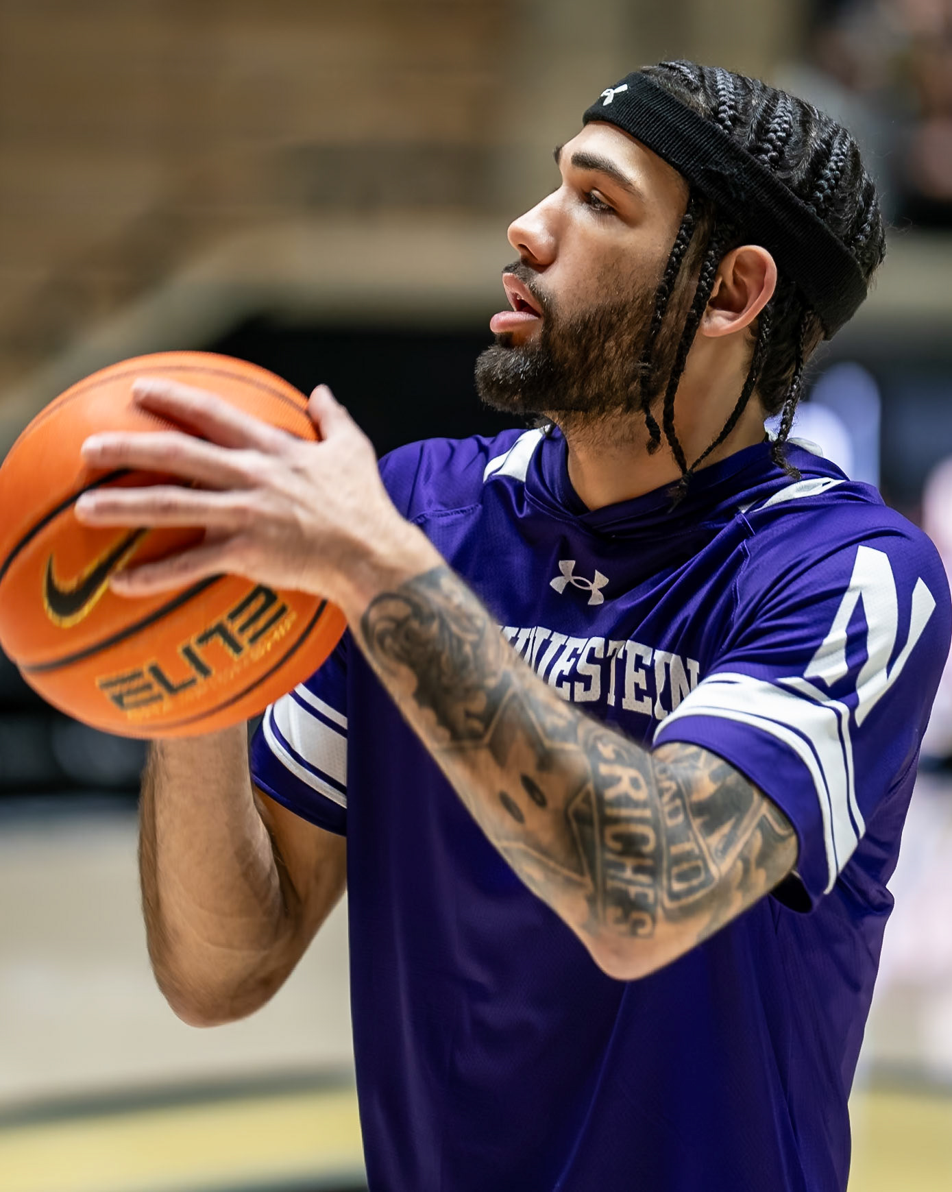 WEST LAFAYETTE, IN - JANUARY 31, 2024: Northwestern Graduate Guard Boo Buie (0) competing in Purdue Boilermakers Mens Basketball versus the Northwestern Wildcats at Mackey Arena(Photo by Steve Bowen / Bowen Arrow Photography / Northern Indiana Sports Report)