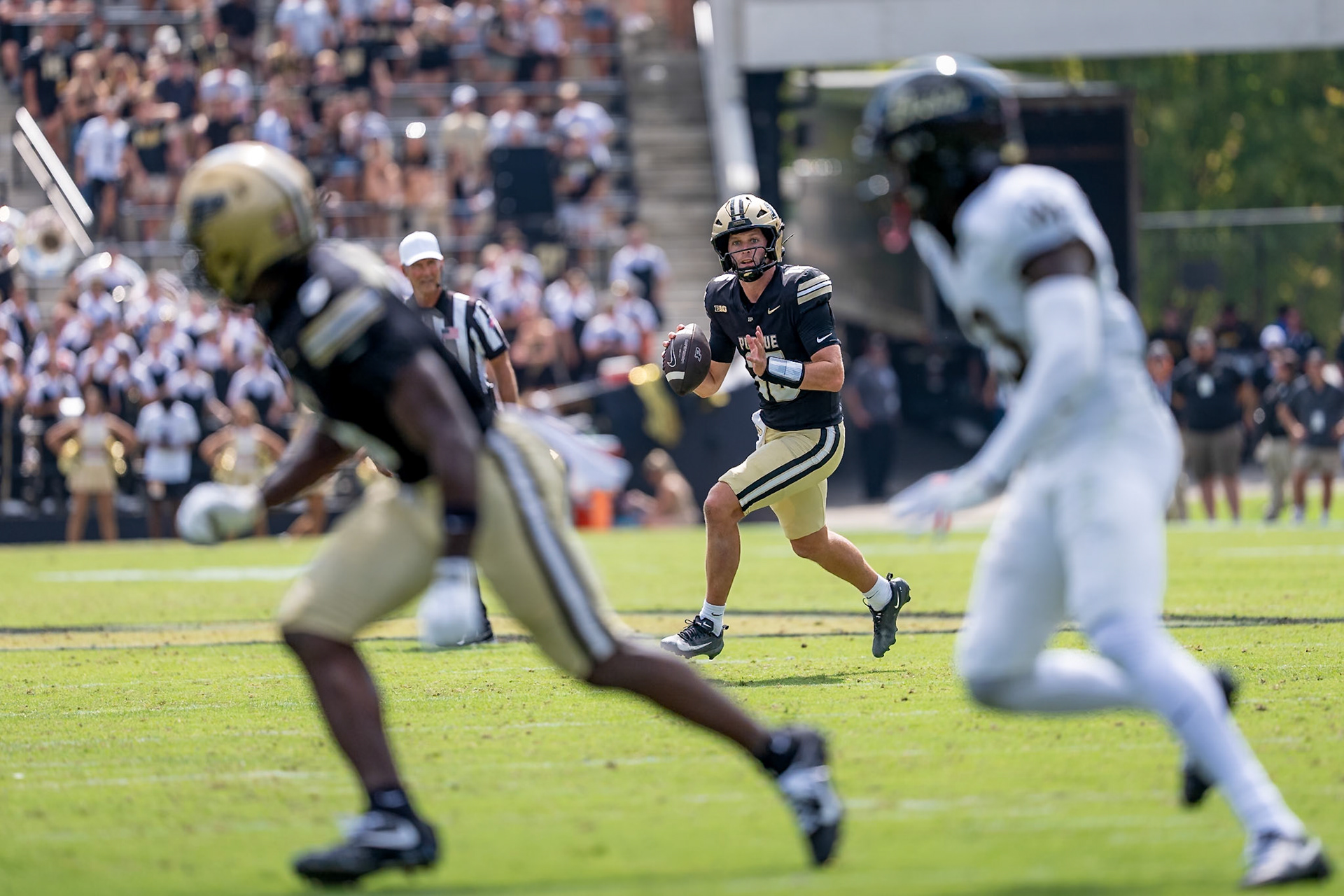 WEST LAFAYETTE, IN - SEPTEMBER 12, 2026: Purdue University Quarterback Ryan Browne (15) rolling out looking for an open receiver near the end zone during the Purdue Boilermakers football game vs the Wake Forest Demon Deacons at Ross-Ade Stadium(Photo by Steve Bowen / Northern Indiana Sports Report)