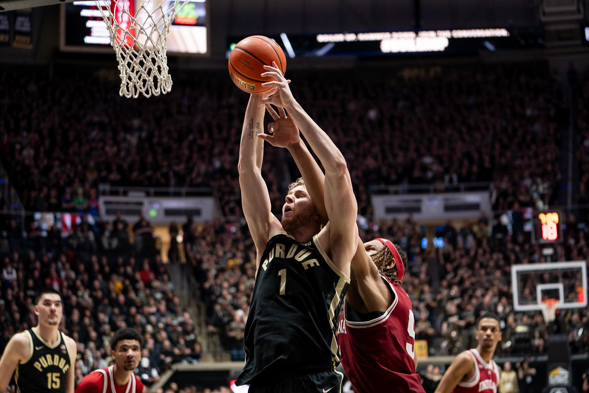 WEST LAFAYETTE, IN - FEBRUARY 10, 2024: Purdue Junior Forward Caleb Furst (1), Indiana Sophomore Forward Malik Reneau (5) in Purdue Boilermaker vs Indiana Hoosiers Basketball at Mackey Arena(Photo by Steve Bowen / Bowen Arrow Photography / Northern Indiana Sports Report)