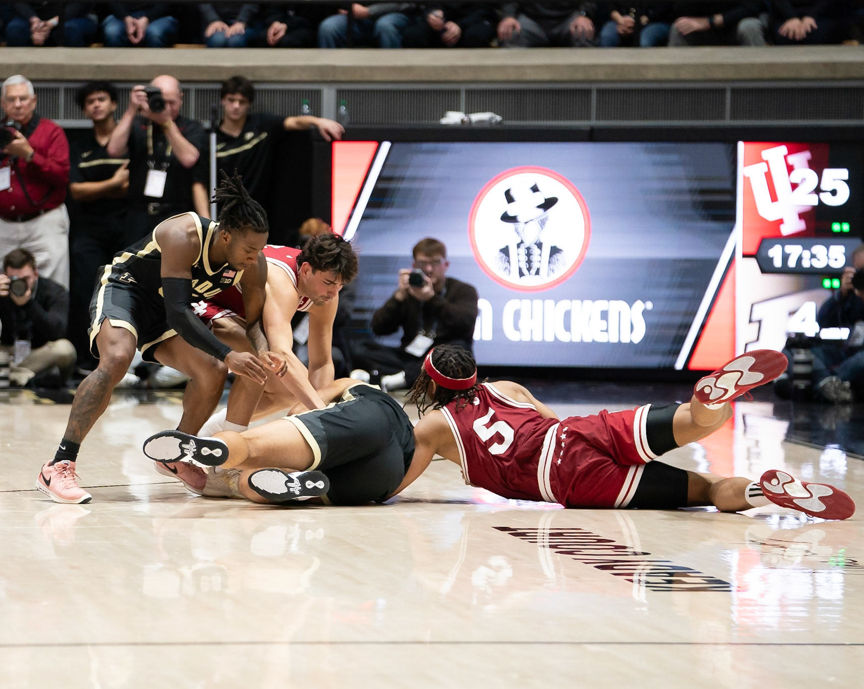 WEST LAFAYETTE, IN - FEBRUARY 10, 2024: Purdue Sophomore Forward Trey Kaufman-Renn (4), Indiana Sophomore Forward Malik Reneau (5), Purdue 5th year Guard Lance Jones (55), Indiana Senior Guard Trey Galloway (32) in Purdue Boilermaker vs Indiana Hoosiers Basketball at Mackey Arena(Photo by Steve Bowen / Bowen Arrow Photography / Northern Indiana Sports Report)