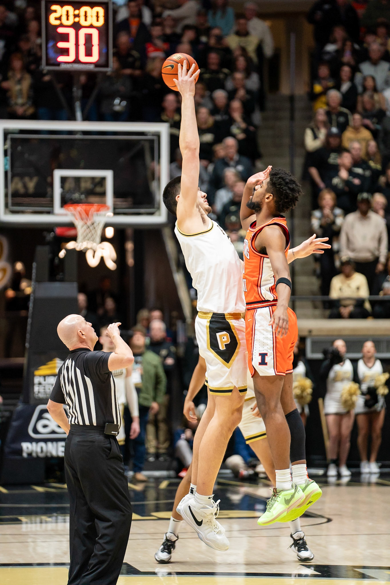 WEST LAFAYETTE, IN - JANUARY 5, 2024: Purdue Senior Center Zach Edey (15), and Illinois Graduate Guard/Forward Quincy Guerrier (13) fighting for the tip in Purdue Boilermaker's Basketball vs the Illinois Fighting Illini at Mackey Arena(Photo by Steve Bowen / Bowen Arrow Photography / Northern Indiana Sports Report)