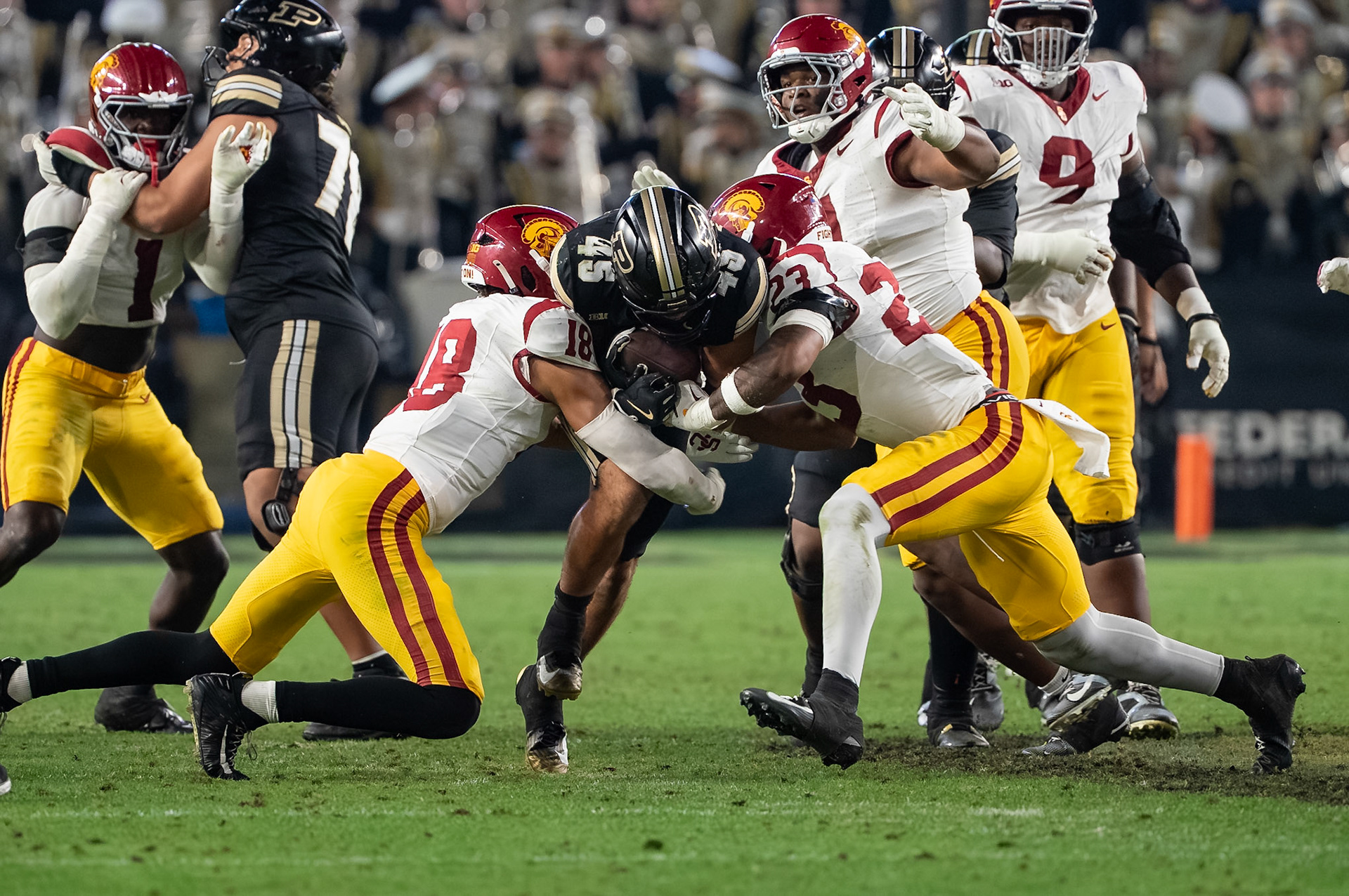 WEST LAFAYETTE, IN - SEPTEMBER 13, 2025: Purdue University Senior Running Back Devin Mockobee (45), =USC Redshirt Senior LB Eric Gentry (18), USC Sophomore LB Desman Stephens II (23) in Purdue Boilermaker Football vs University of Southern California Trojans at Ross-Ade Stadium(Photo by Steve Bowen / Northern Indiana Sports Report)