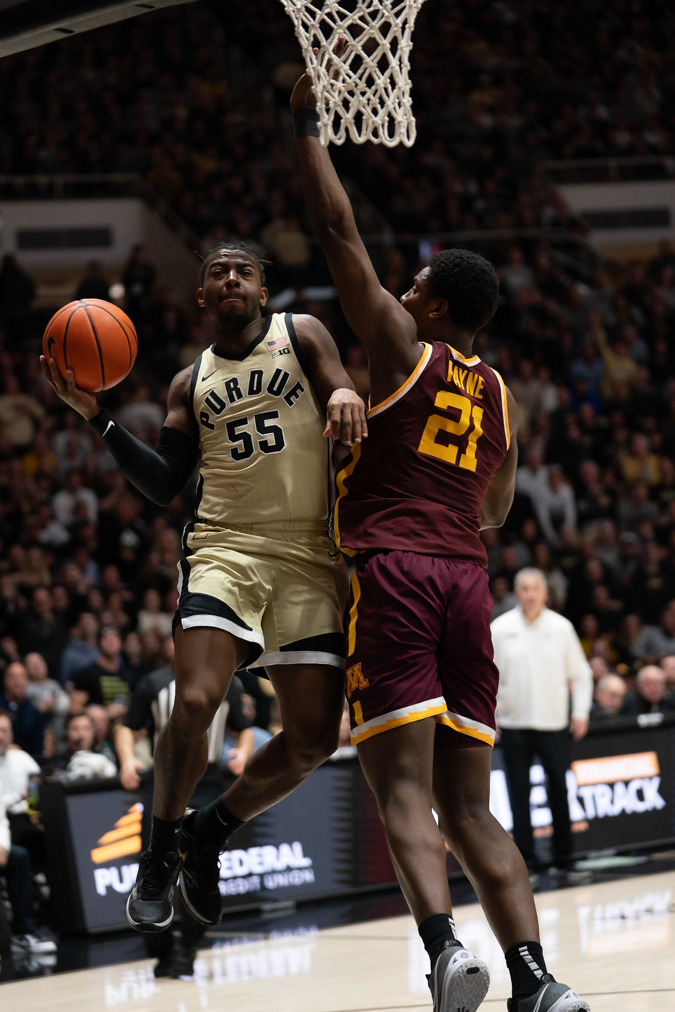 WEST LAFAYETTE, IN - FEBRUARY 15, 2024: Purdue 5th year Guard Lance Jones (55), Minnesota Sophomore Forward Pharrel Payne (21) in Purdue Boilermakers Men's Basketball vs the Minnesota Golden Gophers at Mackey Arena(Photo by Steve Bowen / Bowen Arrow Photography / Northern Indiana Sports Report)