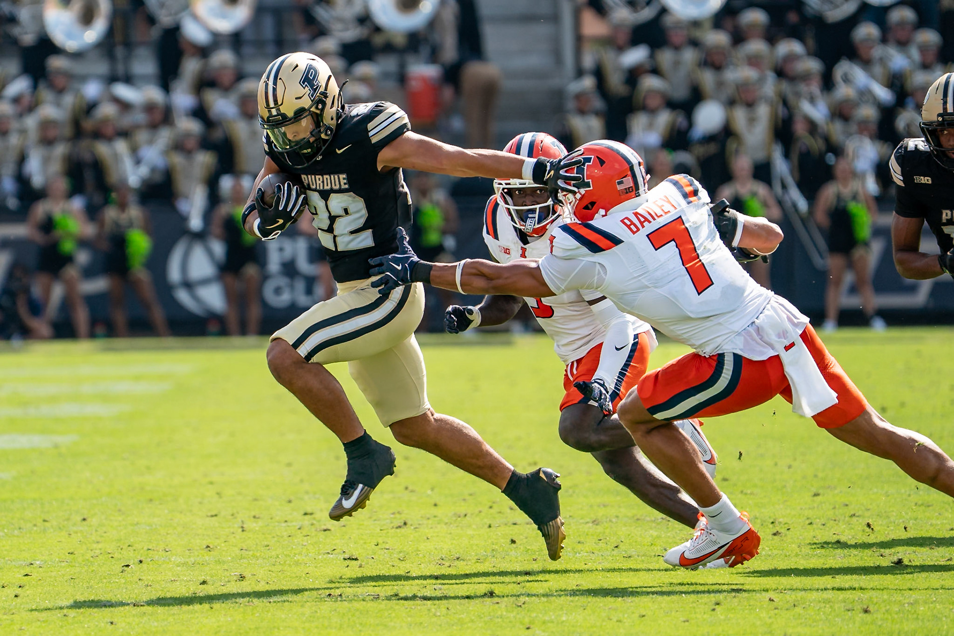 WEST LAFAYETTE, IN - OCTOBER 4, 2025: Purdue University Sophomore Running Back Antonio Harris (22) stiff arms University of Illinois Junior DB Matthew Bailey (7) in Purdue Boilermaker Football vs University of Illinois Fighting Illini at Ross-Ade Stadium(Photo by Steve Bowen / Northern Indiana Sports Report)