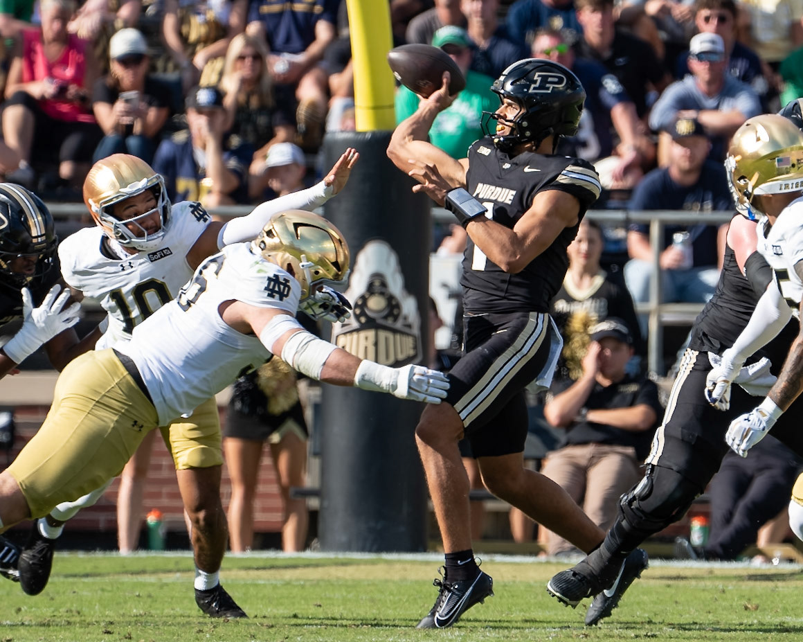 WEST LAFAYETTE, IN - SEPTEMBER 26, 2026: Purdue University Sophomore Quarterback Evans Chuba (1), Notre Dame University Senior DL Elijah Hughes (56) during the Purdue Boilermakers vs Notre Dame Fighting Irish football game at Ross-Ade Stadium(Photo by Steve Bowen / Northern Indiana Sports Report)
