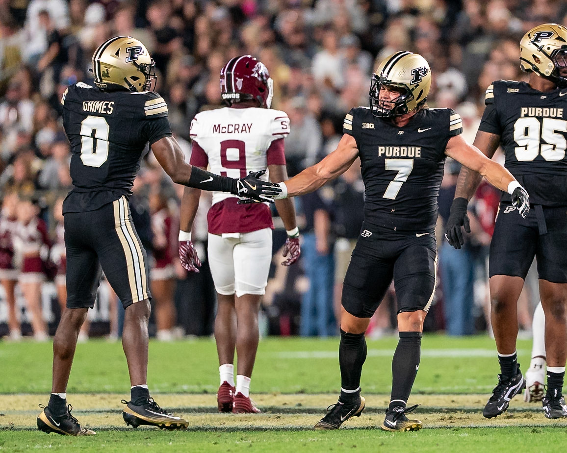 WEST LAFAYETTE, IN - SEPTEMBER 6, 2025: Purdue University Senior Defensive Back Crew Wakley (7) and Purdue University Senior Defensive Back Tony Grimes (0) celebrate a big stop at Purdue Boilermaker Football vs Southern Illinois Saluki Football at Ross-Ade Stadium(Photo by Steve Bowen / Northern Indiana Sports Report)