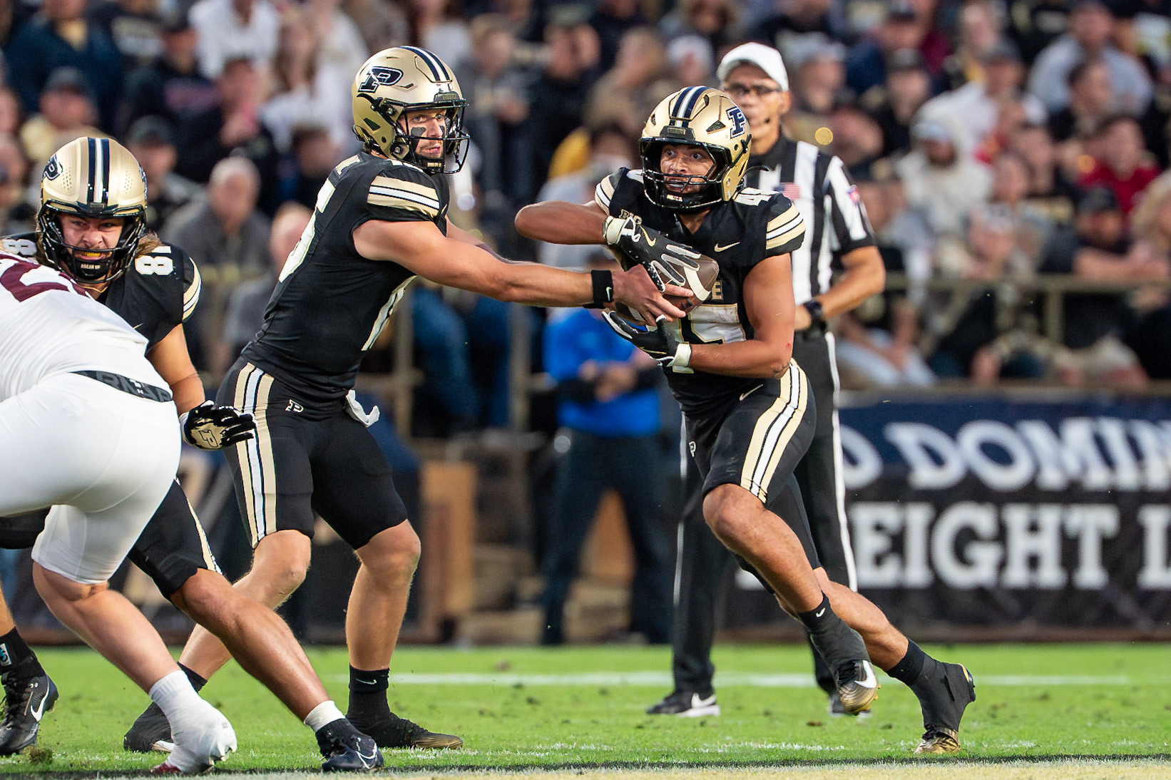 WEST LAFAYETTE, IN - SEPTEMBER 6, 2025: Purdue University Sophomore Quaterback Ryan Browne (15) hands off to Purdue University Senior Running Back Devin Mockobee (45) at Purdue Boilermaker Football vs Southern Illinois Saluki Football at Ross-Ade Stadium(Photo by Steve Bowen / Northern Indiana Sports Report)