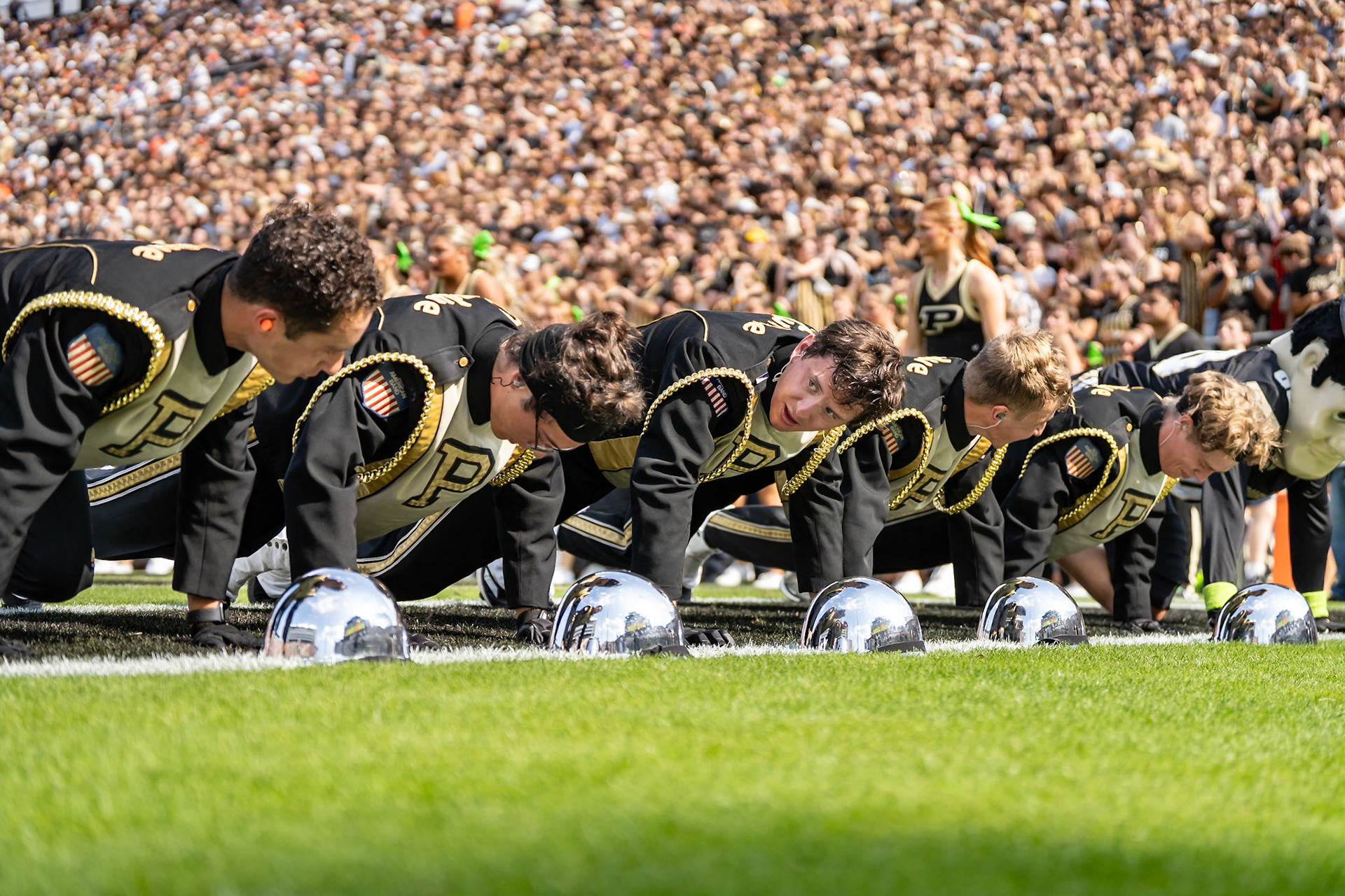 WEST LAFAYETTE, IN - OCTOBER 4, 2025: Purdue University “All-American” Marching Band members doing pushups after the Boilermakers scored during the Purdue Boilermaker Football vs University of Illinois Fighting Illini at Ross-Ade Stadium(Photo by Steve Bowen / Northern Indiana Sports Report)