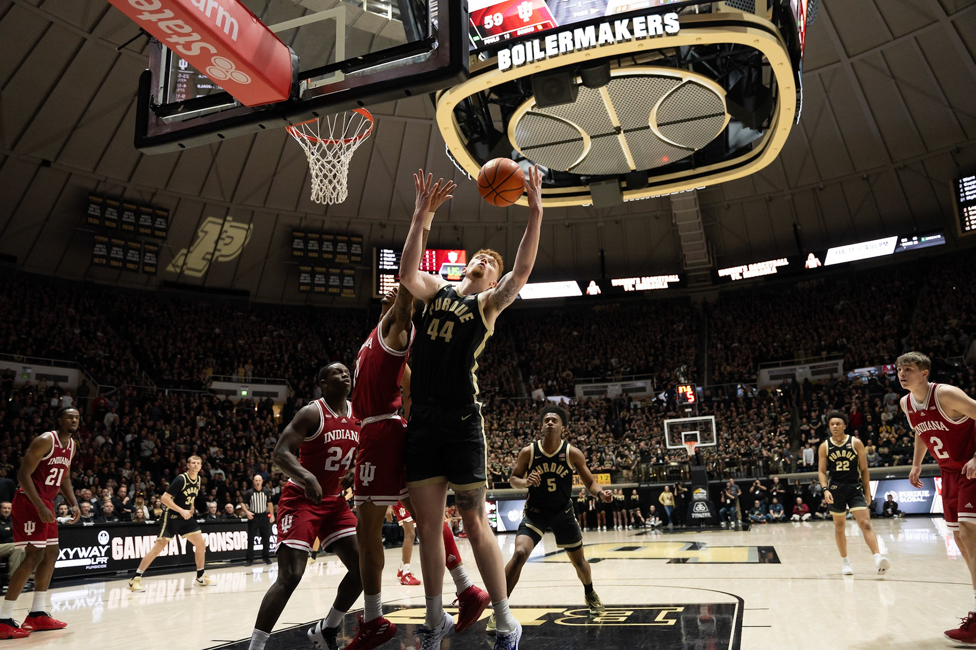 WEST LAFAYETTE, IN - FEBRUARY 10, 2024: Purdue Redshirt Freshman Center Will Berg (44), Indiana Sophomore Guard CJ Gunn (11) in Purdue Boilermaker vs Indiana Hoosiers Basketball at Mackey Arena(Photo by Steve Bowen / Bowen Arrow Photography / Northern Indiana Sports Report)