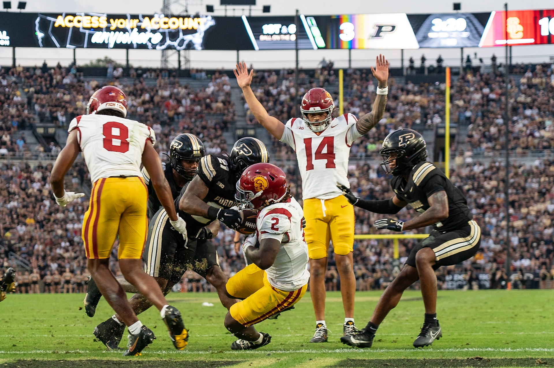 WEST LAFAYETTE, IN - SEPTEMBER 13, 2025: USC Junior RB Waymond Jordan (2), Purdue University Senior Defensive Back Tahj Ra-El (21), USC Redshirt Junior QB Jayden Maiava (14), Purdue University Sophomore Defensive Back Hudauri Hines (4) in Purdue Boilermaker Football vs University of Southern California Trojans at Ross-Ade Stadium(Photo by Steve Bowen / Northern Indiana Sports Report)
