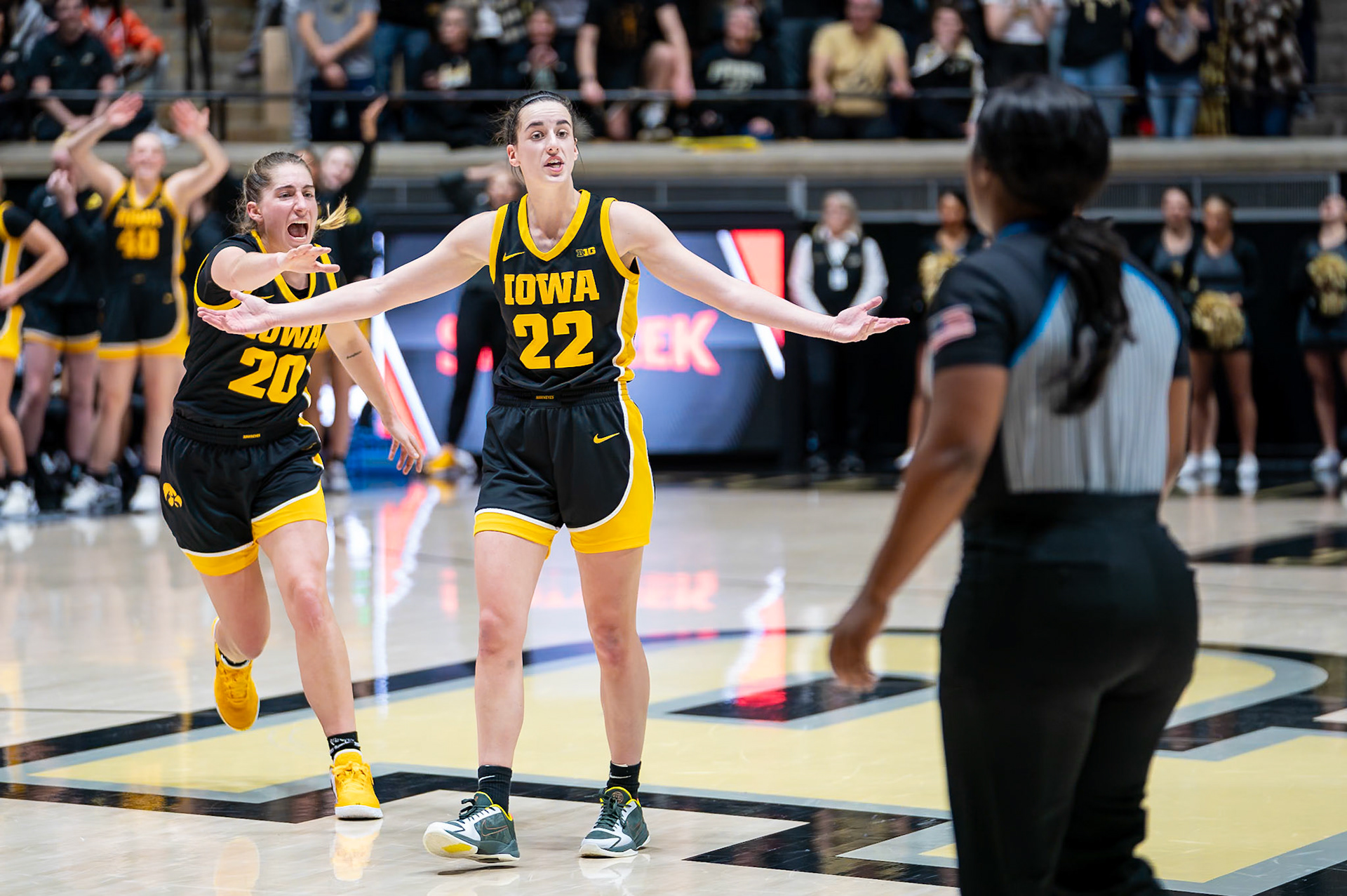 WEST LAFAYETTE, IN - JANUARY 10, 2024: Iowa Guard Senior Caitlin Clark (22), Iowa Guard Graduate Kate Martin (20) competing in Purdue Boilermaker Women's Basketball vs the Iowa Hawkeyes at Mackey Arena(Photo by Steve Bowen / Bowen Arrow Photography / Northern Indiana Sports Report)