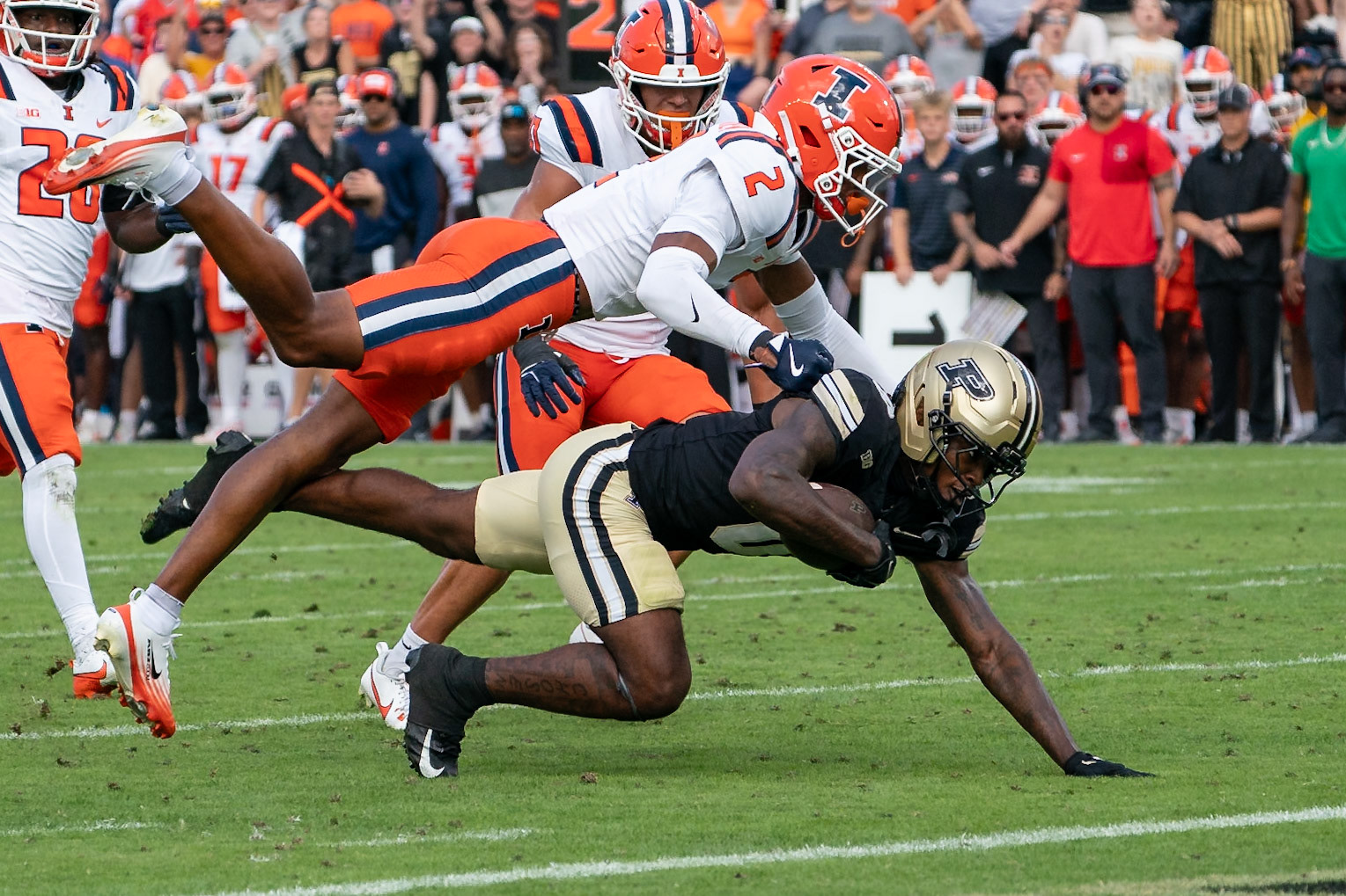 WEST LAFAYETTE, IN - OCTOBER 4, 2025: Purdue University Sophomore Wide Receiver Nitro Tuggle (0) diving for the end one while University of Illinois Junior WR Ashton Hollins (2) tries to tackle him during the Purdue Boilermaker Football vs University of Illinois Fighting Illini at Ross-Ade Stadium(Photo by Steve Bowen / Northern Indiana Sports Report)