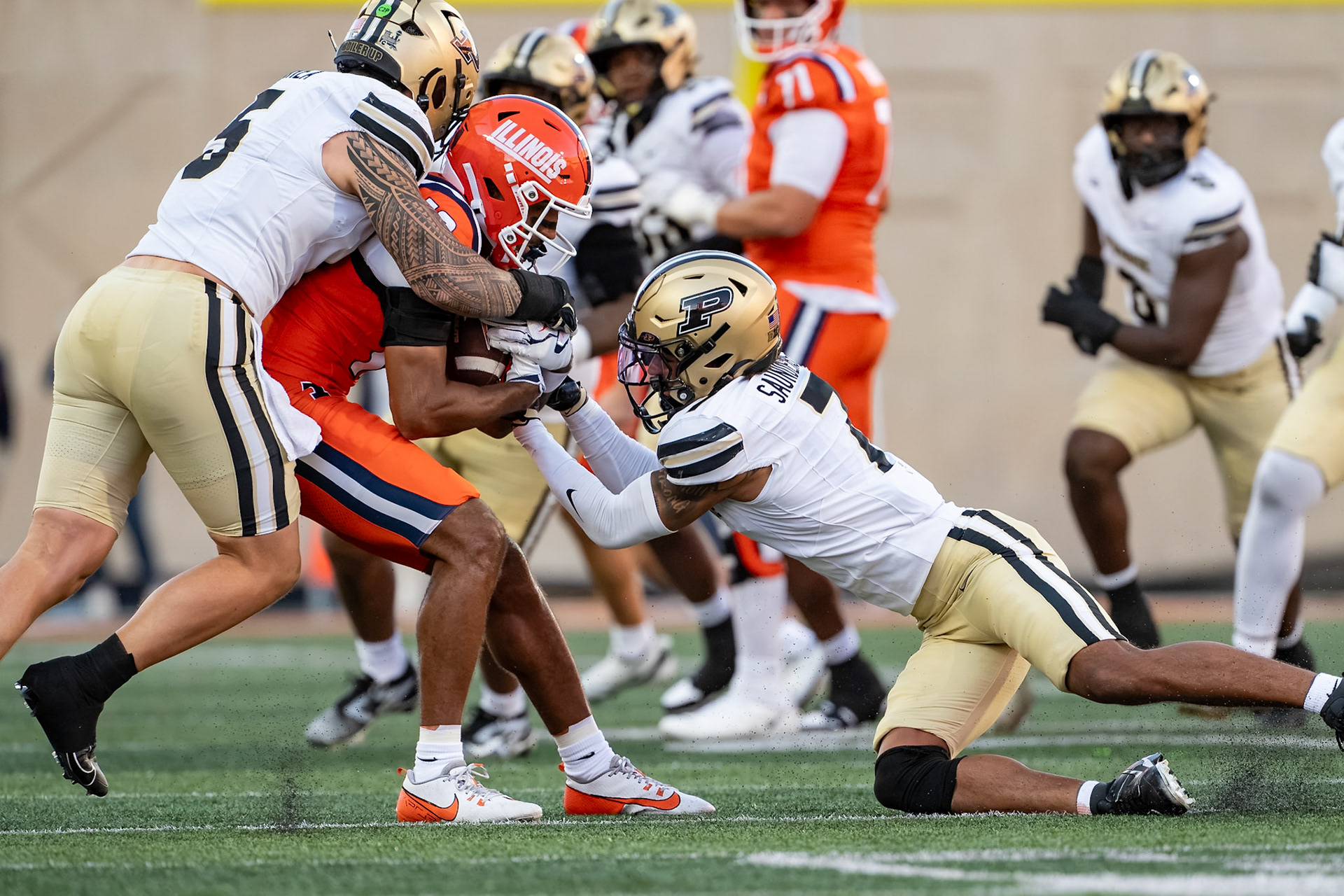 CHAMPAIGN, IL - OCTOBER 3, 2026: University of Illinois 6th Year WR Ty Robinson (10), Purdue University Junior Linebacker Charles Correa (5), Purdue University Senior Defensive Back Donovan Saunders (7) during the Purdue Boilermakers at Illinois Fighting Illini football game at Gies Memorial Stadium(Photo by Steve Bowen / Northern Indiana Sports Report)