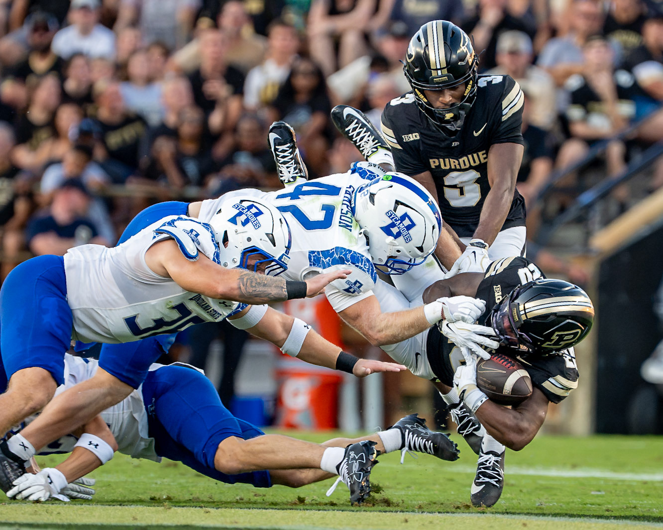WEST LAFAYETTE, IN - SEPTEMBER 4, 2026: Purdue University Freshman Running Back Antonio Harris (22) diving for more yardage after being hit by Indiana State University Linebacker Braxton Sampson (42) during the Purdue Boilermaker Football game vs the Indiana State Sycamores at Ross-Ade Stadium(Photo by Steve Bowen / Northern Indiana Sports Report)