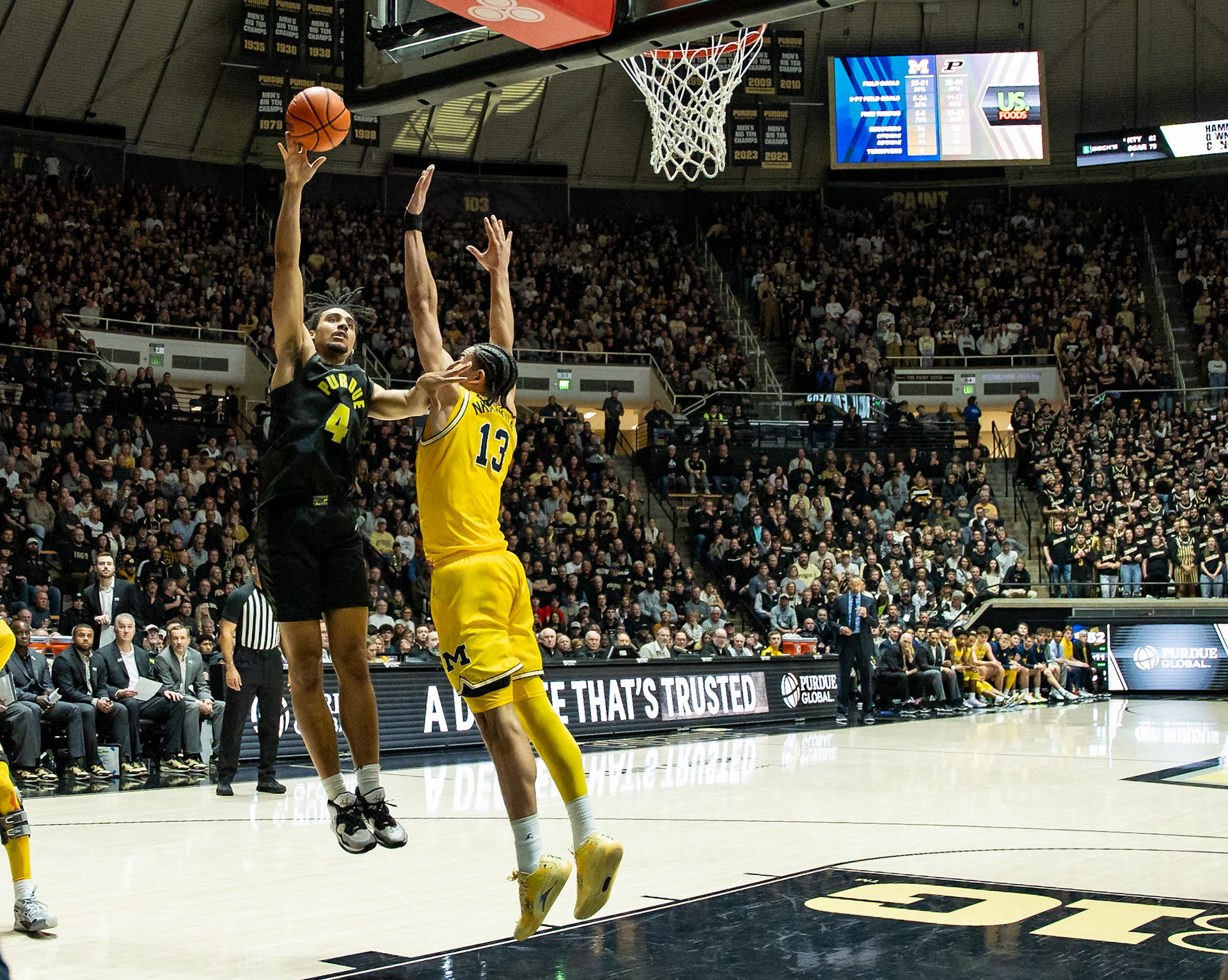 WEST LAFAYETTE, IN - JANUARY 23, 2024: Purdue Sophomore Forward Trey Kaufman-Renn (4), Michigan Graduate Forward Olivier Nkamhoua (13) competing in Purdue versus Michigan Mens Basketball at Mackey Arena(Photo by Steve Bowen / Bowen Arrow Photography / Northern Indiana Sports Report)