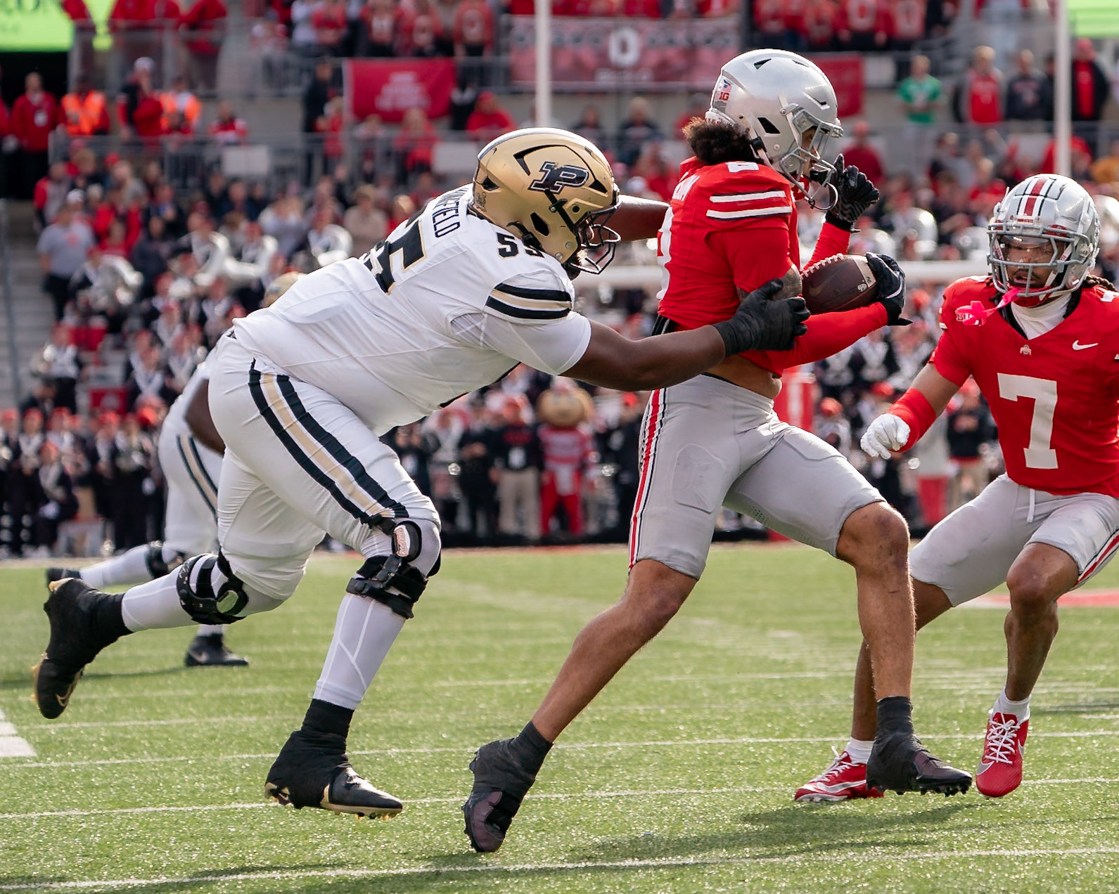 COLUMBUS UNIVERSITY, OH - NOVEMBER 9, 2024: Ohio State University Senior Safety Lathan Ransom (8) runs back an interception as Purdue University's Senior Offensive Lineman DJ Wingfield (55) trys to tackle him in Purdue University Boilermakers at University of Ohio Buckeyes Football game at Ohio Stadium(Photo by Steve Bowen / Bowen Arrow Photography / Northern Indiana Sports Report)
