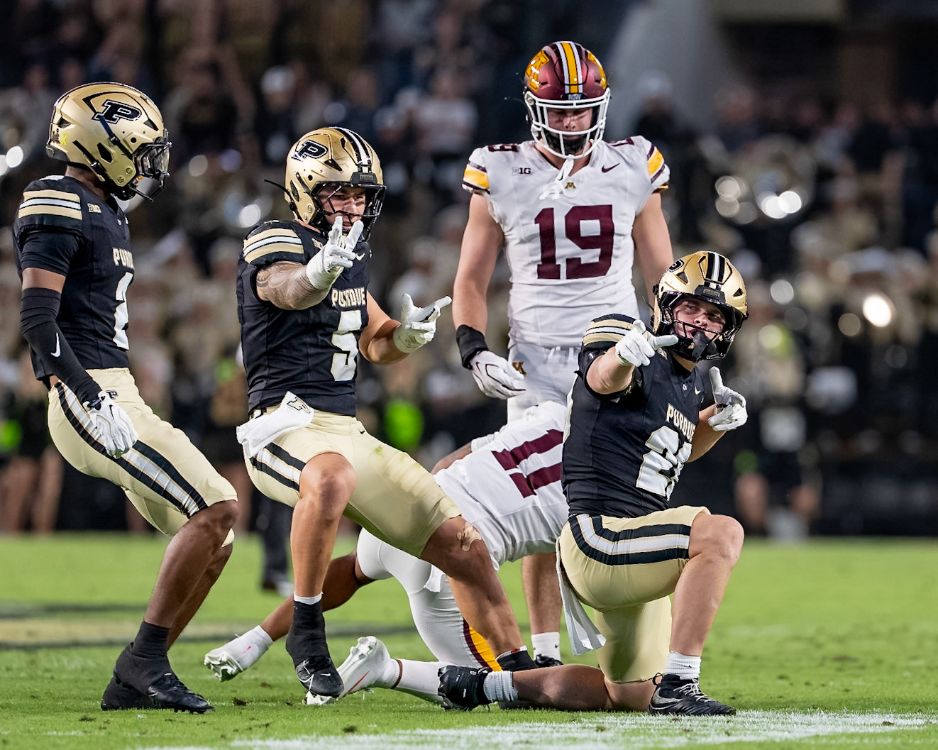 WEST LAFAYETTE, IN - OCTOBER 10, 2026: Purdue University Linebacker Winston Berglund (20), Purdue University Junior Linebacker Charles Correa (5), Purdue University Senior Defensive Back Donovan Saunders (7), University of Minnesota 5th Year WR Javon Tracy (11) during the Purdue Boilermakers vs Minnesota Golden Gophers football game at Ross-Ade Stadium(Photo by Steve Bowen / Northern Indiana Sports Report)