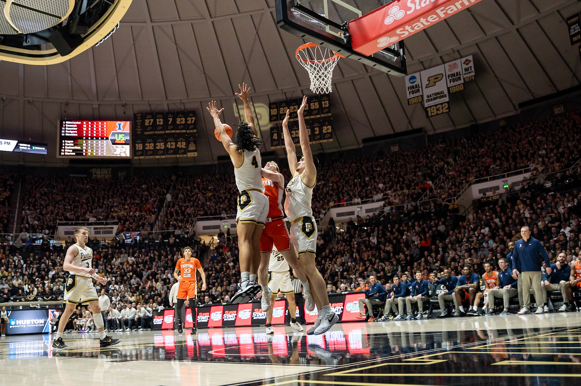WEST LAFAYETTE, IN - JANUARY 5, 2024: Purdue Sophomore Forward Trey Kaufman-Renn (4) and Purdue Senior Center Zach Edey (15) block Illinois Graduate Guard/Forward Marcus Domask's (3) attempt to shoot in Purdue Boilermaker's Basketball vs the Illinois Fighting Illini at Mackey Arena(Photo by Steve Bowen / Bowen Arrow Photography / Northern Indiana Sports Report)