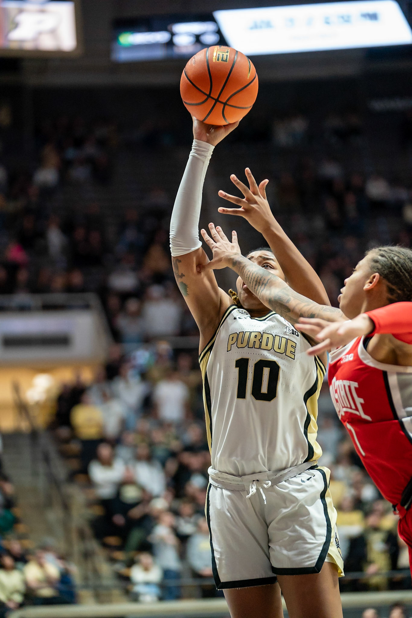 WEST LAFAYETTE, IN - JANUARY 28, 2024: Purdue 5th Year Guard Jeanae Terry (10), Ohio State Guard Redshirt Senior Rikki Harris (1) competing in Purdue Boilermaker Women's Basketball versus the Ohio State Buckeyes at Mackey Arena(Photo by Steve Bowen / Bowen Arrow Photography / Northern Indiana Sports Report)