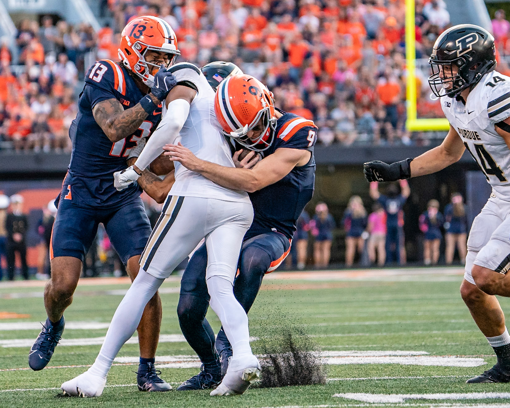 CHAMPAIGN, IL - OCTOBER 12, 2024: University of Illinois Junior QB Luke Altmyer (9), University of Illinois Senior WR Pat Bryant (13), Purdue University Junior Defensive Back Nyland Green (2), Purdue University Junior Linebacker Yanni Karlaftis (14) during the Purdue University Boilermakers at University of Illinois Fighting Illini Football game at Memorial Stadium(Photo by Steve Bowen / Bowen Arrow Photography / Northern Indiana Sports Report)