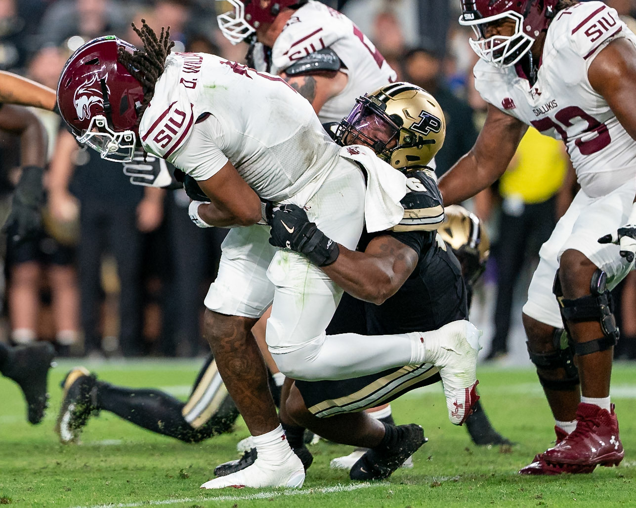 WEST LAFAYETTE, IN - SEPTEMBER 6, 2025: Purdue University Senior Linebacker Mani Powell (16) brings down Southern Illinois University Sr. QB DJ Williams (1) at Purdue Boilermaker Football vs Southern Illinois Saluki Football at Ross-Ade Stadium(Photo by Steve Bowen / Northern Indiana Sports Report)