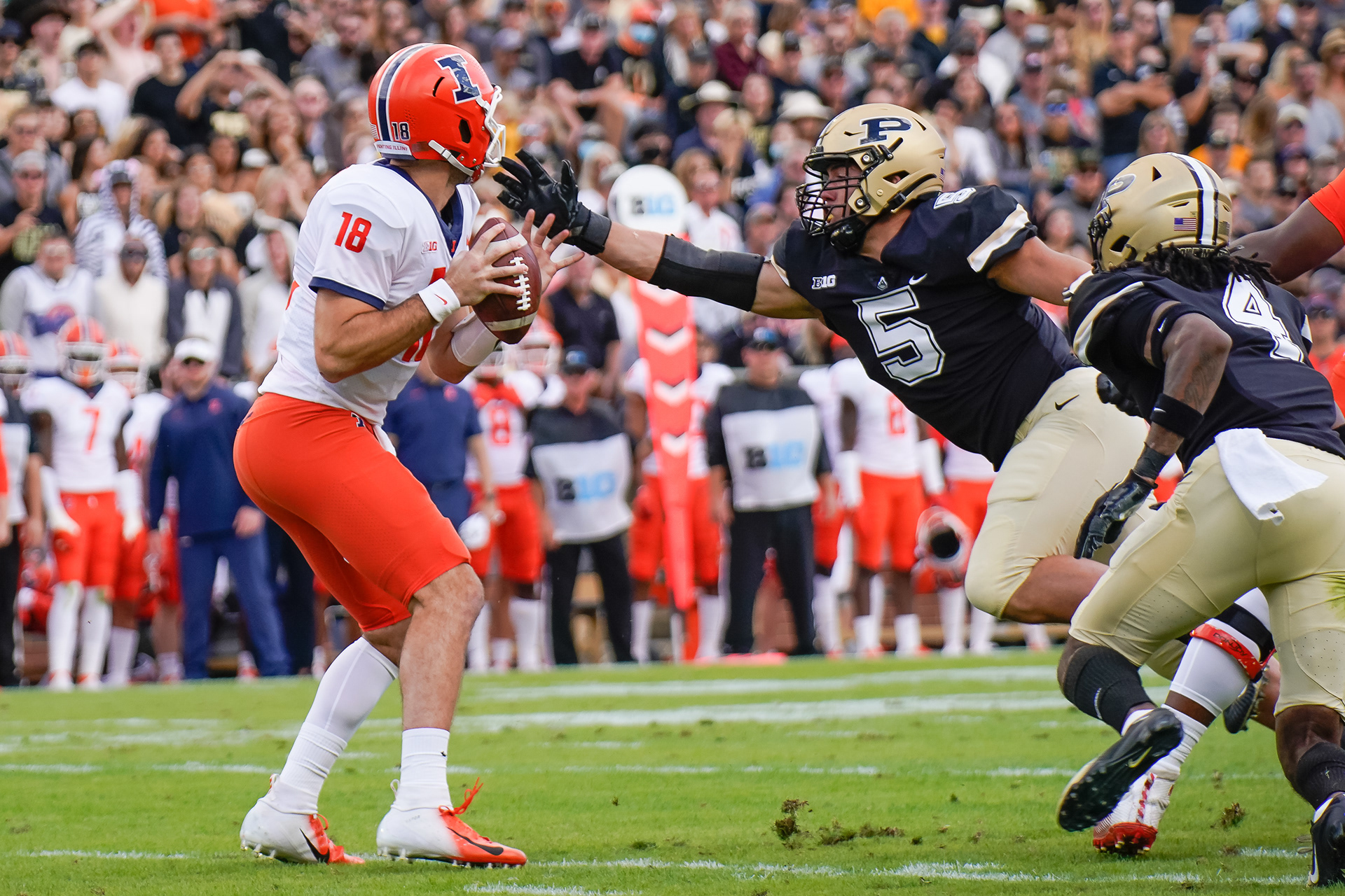 George Karlaftis (5), West Lafayette, IN reaching for the sack and fumble