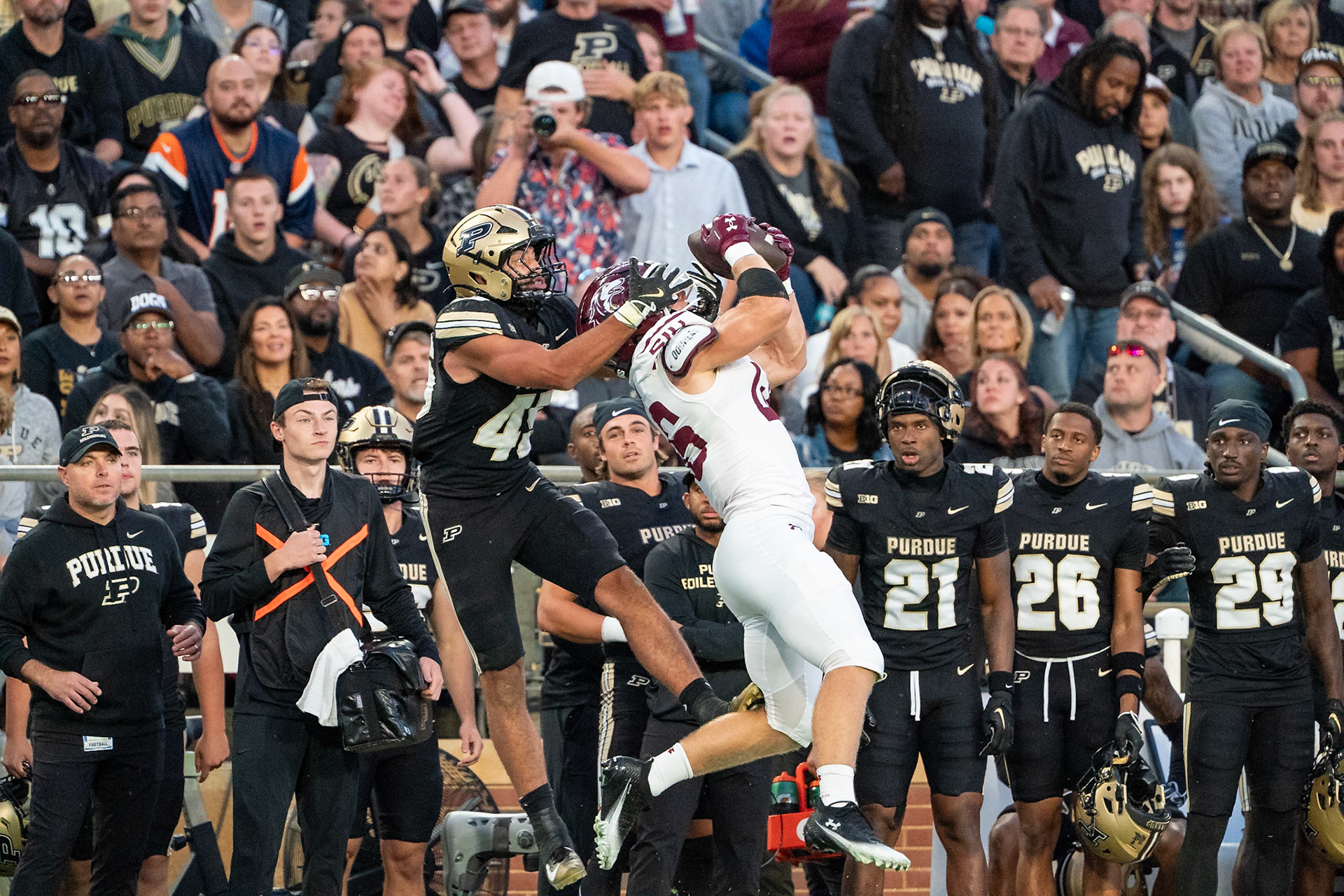 WEST LAFAYETTE, IN - SEPTEMBER 6, 2025: Southern Illinois University Sr. LB Colin Bohanek (16) catches a would be interception in front of Purdue University Senior Running Back Devin Mockobee (45). The interception was called back by a penalty at Purdue Boilermaker Football vs Southern Illinois Saluki Football at Ross-Ade Stadium(Photo by Steve Bowen / Northern Indiana Sports Report)