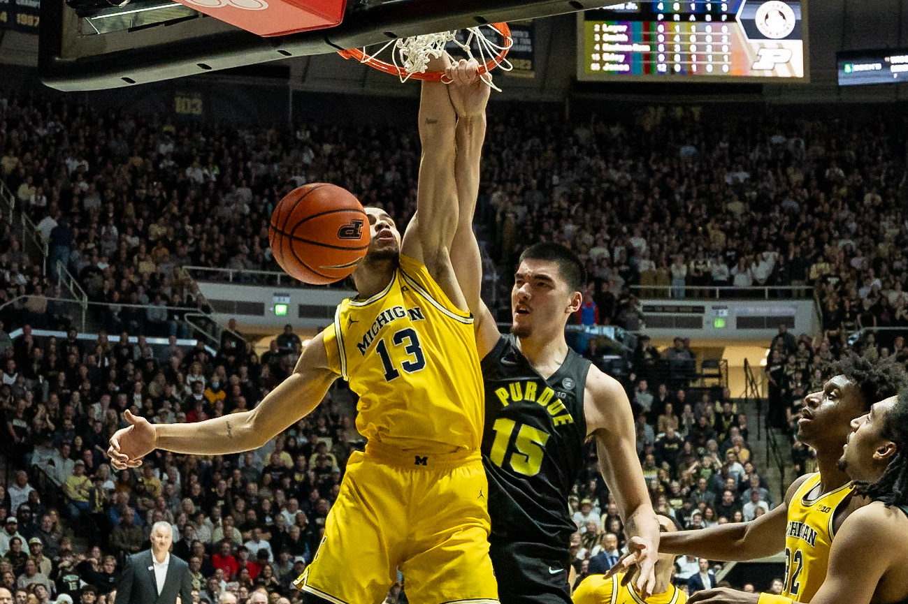 WEST LAFAYETTE, IN - JANUARY 23, 2024: Purdue Senior Center Zach Edey (15), Michigan Graduate Forward Olivier Nkamhoua (13) competing in Purdue versus Michigan Mens Basketball at Mackey Arena(Photo by Steve Bowen / Bowen Arrow Photography / Northern Indiana Sports Report)