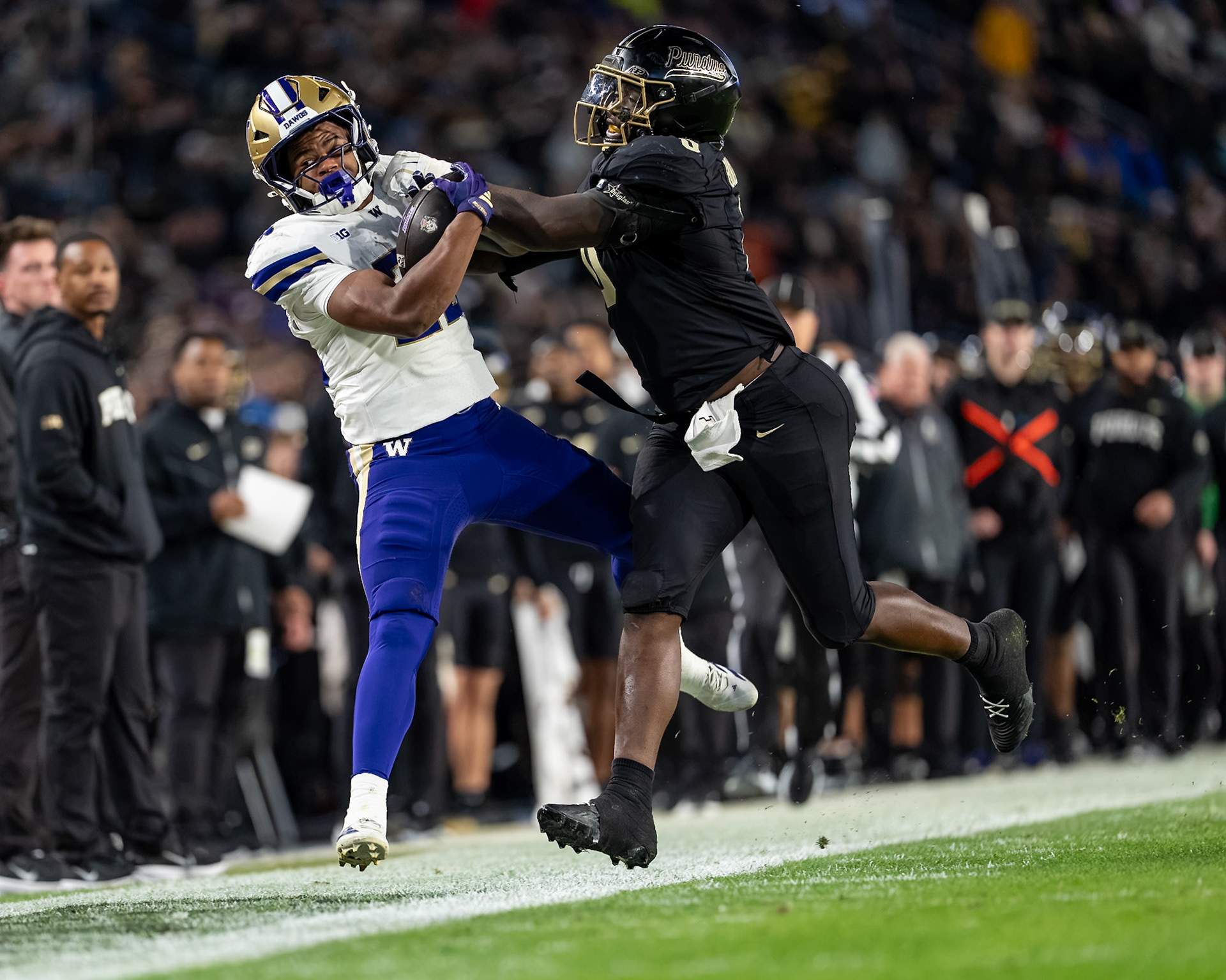 WEST LAFAYETTE, IN - OCTOBER 16, 2026: University of Washington 6th Year RB Trey Cooley (22), Purdue University Junior Linebacker Jojo Hayden (0) during the Purdue Boilermakers vs Washington Huskies football game at Ross-Ade Stadium(Photo by Steve Bowen / Northern Indiana Sports Report)