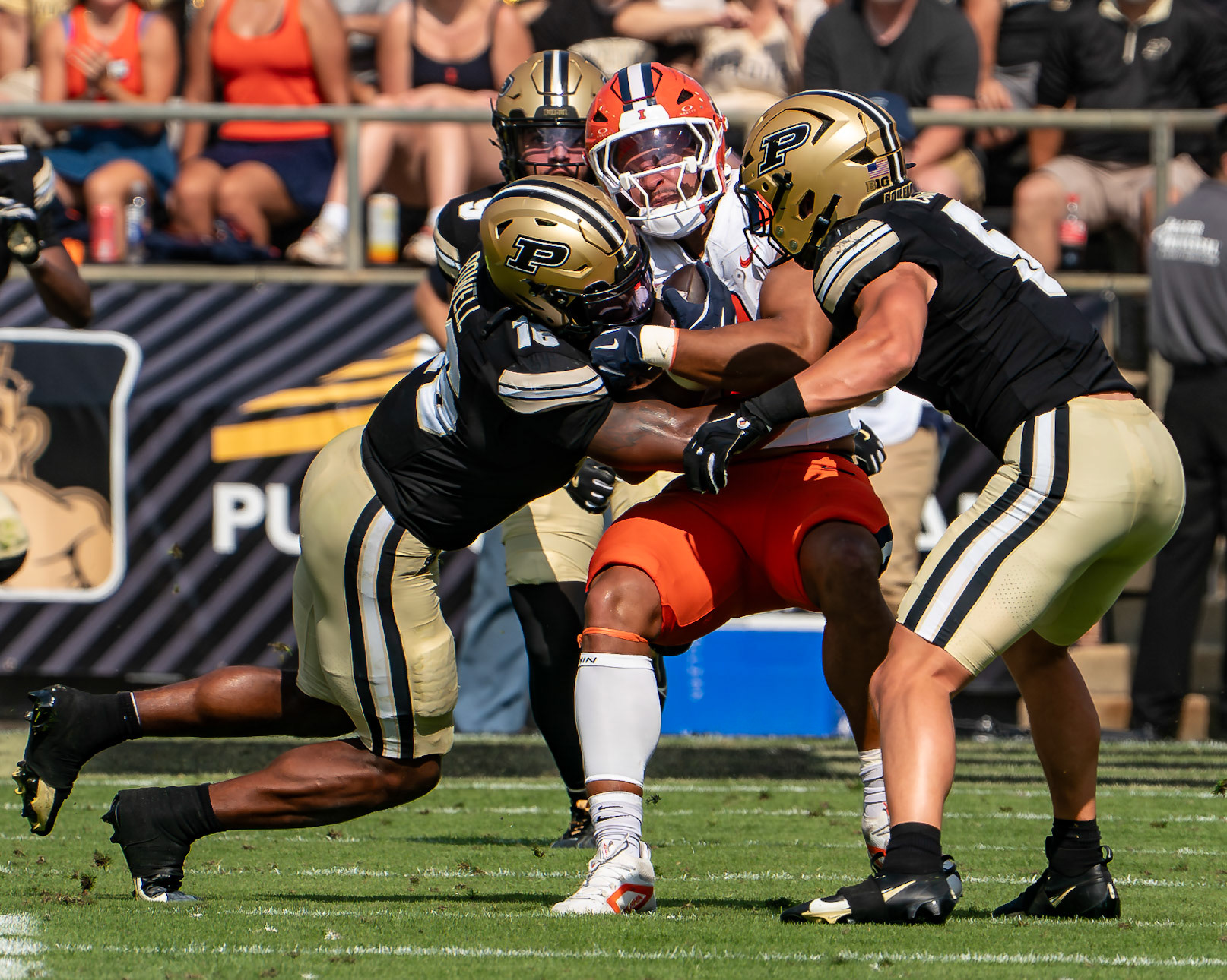 WEST LAFAYETTE, IN - OCTOBER 4, 2025: University of Illinois Junior RB Kaden Feagin (3) gets a big hit from  Purdue University Senior Linebacker Mani Powell (16)during the Purdue Boilermaker Football vs University of Illinois Fighting Illini at Ross-Ade Stadium(Photo by Steve Bowen / Northern Indiana Sports Report)