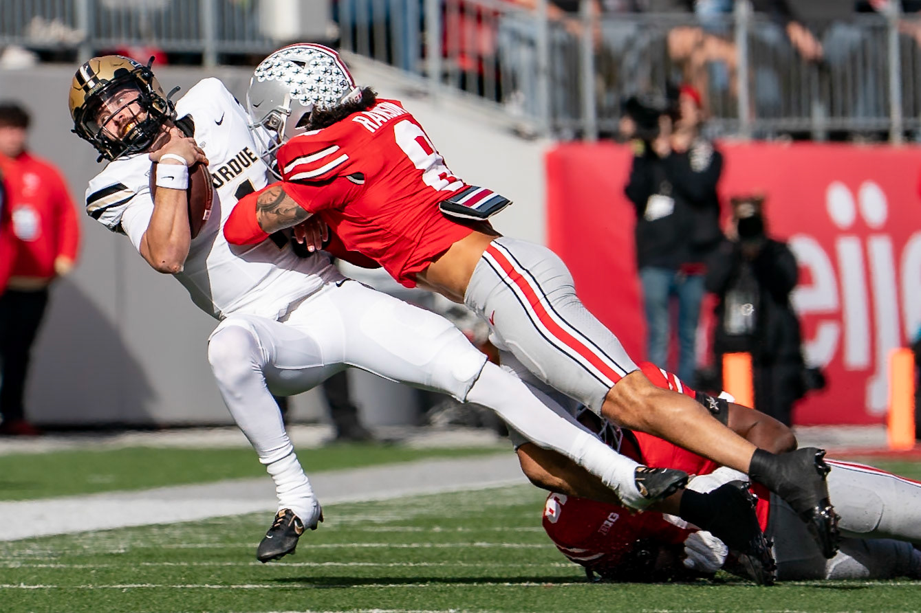 COLUMBUS UNIVERSITY, OH - NOVEMBER 9, 2024: Purdue University Senior Quaterback Hudson Card (1) takes a big hit from Ohio State University Senior Safety Lathan Ransom (8) in Purdue University Boilermakers at University of Ohio Buckeyes Football game at Ohio Stadium(Photo by Steve Bowen / Bowen Arrow Photography / Northern Indiana Sports Report)