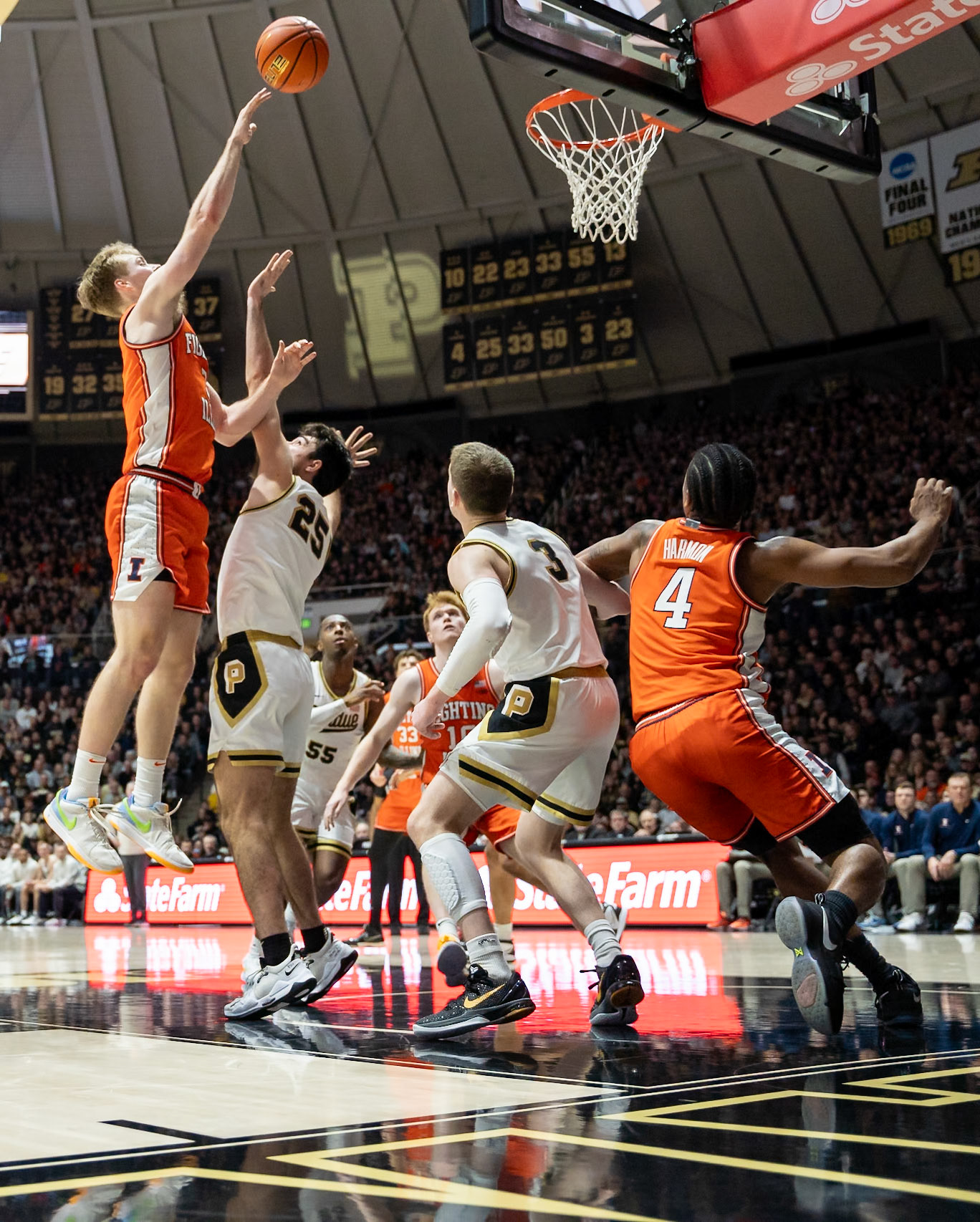 WEST LAFAYETTE, IN - JANUARY 5, 2024: Illinois Graduate Guard/Forward Marcus Domask (3) putting up a shot as Purdue Senior Guard Ethan Morton (25) tries to block him while Purdue Sophomore Guard Braden Smith (3) and Illinois Graduate Guard Justin Harmon (4) work to block each other out in Purdue Boilermaker's Basketball vs the Illinois Fighting Illini at Mackey Arena(Photo by Steve Bowen / Bowen Arrow Photography / Northern Indiana Sports Report)